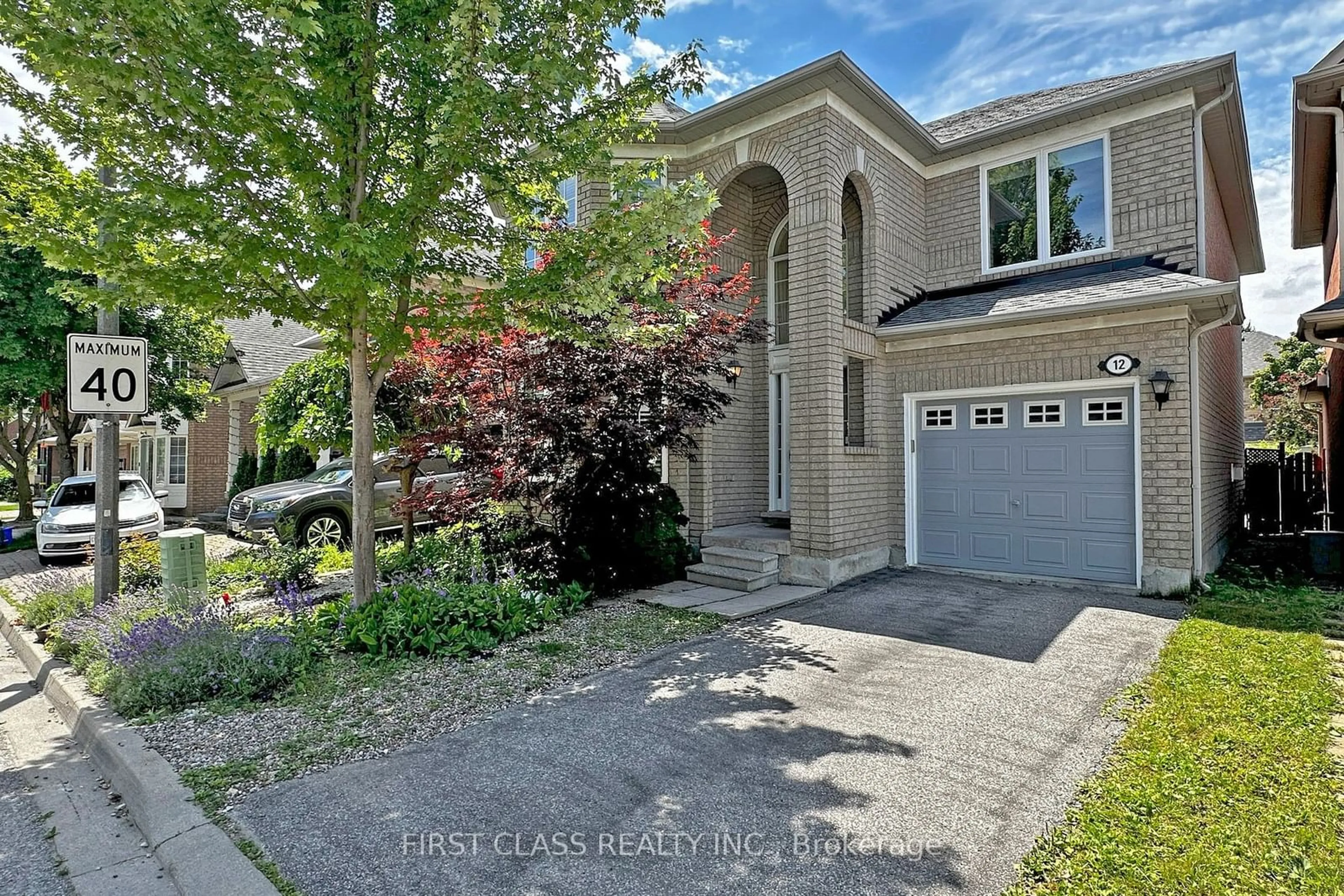 A pic from exterior of the house or condo for 12 Abbotsbury Lane, Markham Ontario L6C 2N2