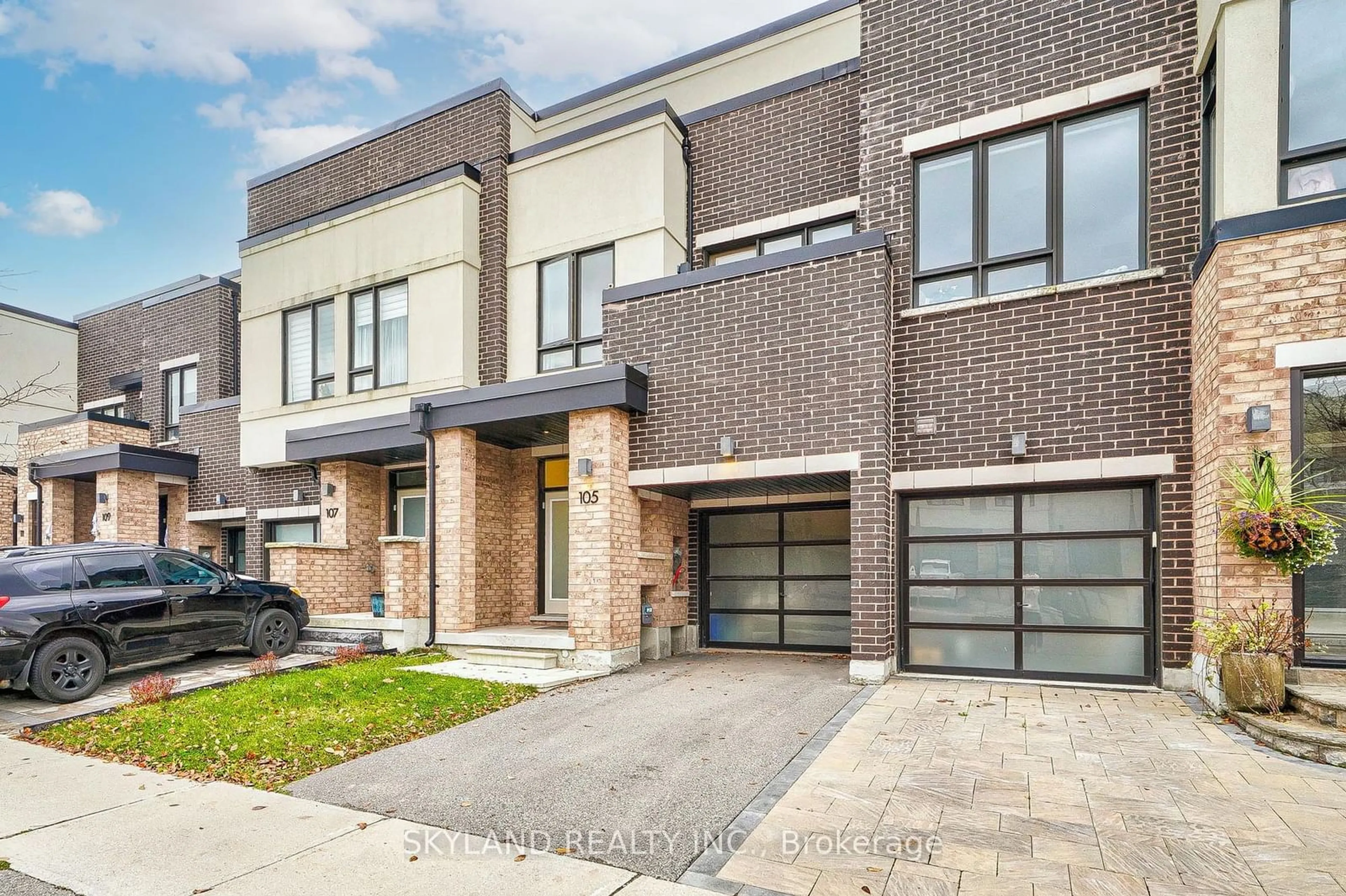 Home with brick exterior material for 105 Anchusa Dr, Richmond Hill Ontario L4C 6W3