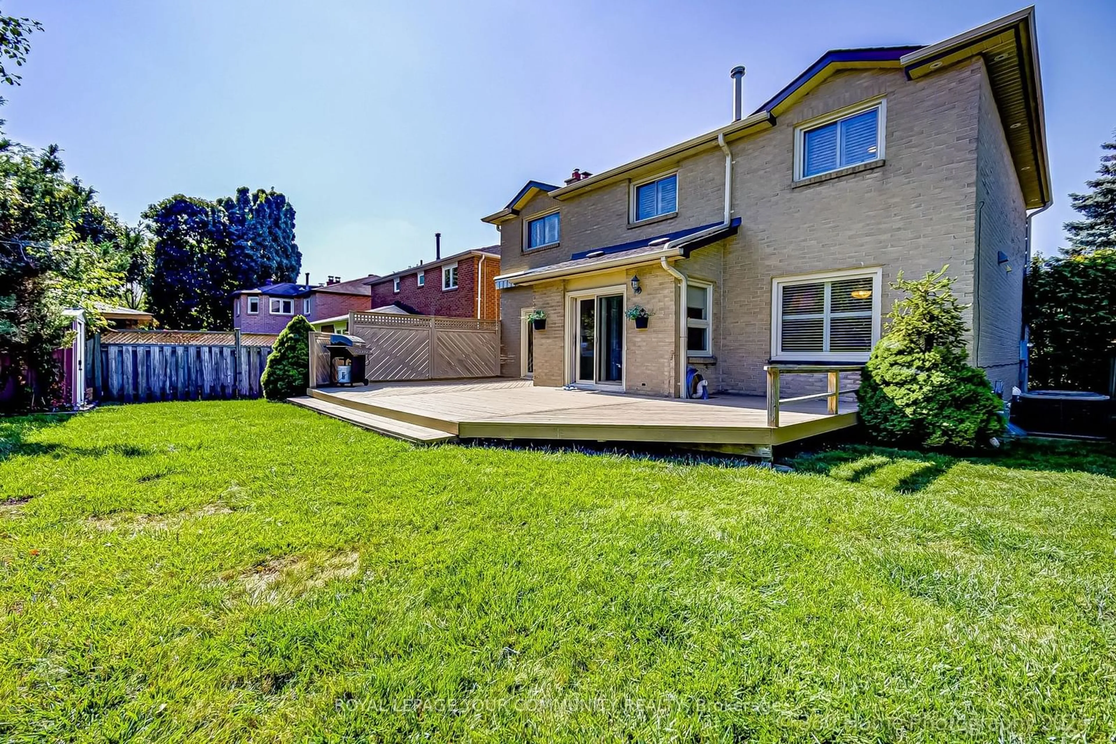 Frontside or backside of a home, the fenced backyard for 53 Marsh St, Richmond Hill Ontario L4C 7R6