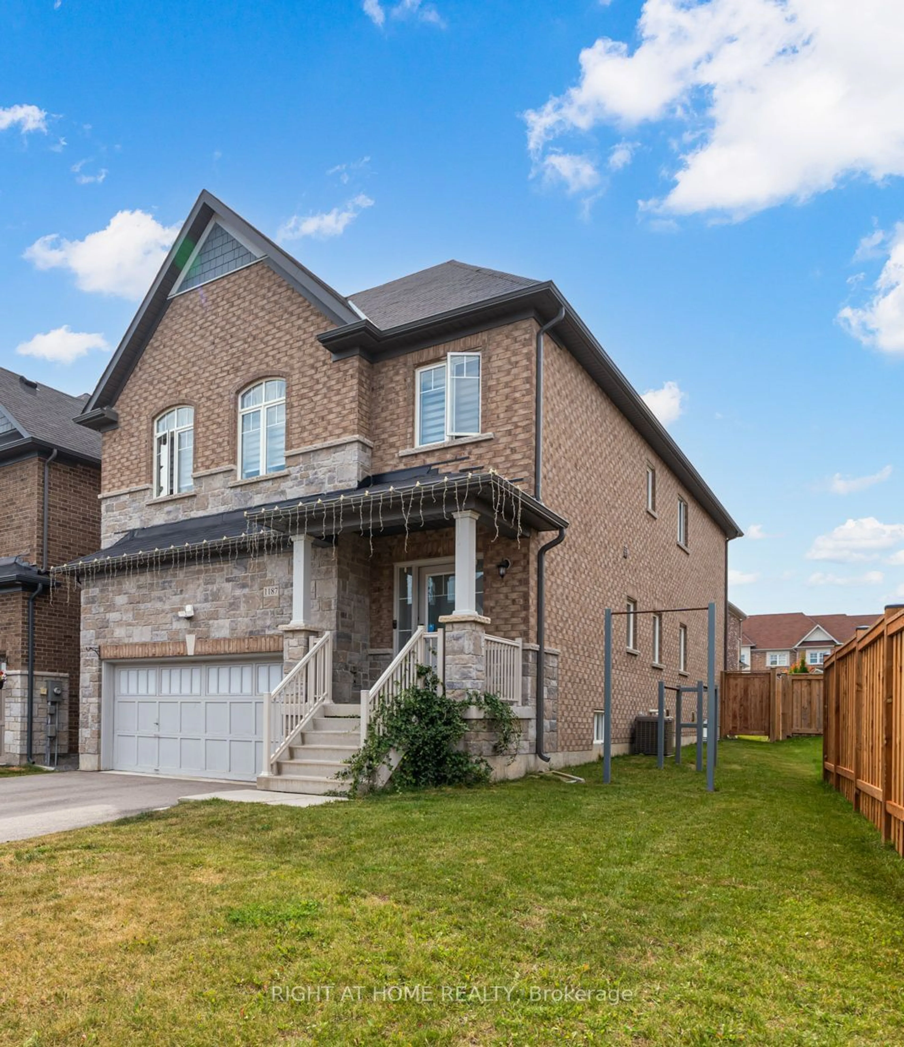 Frontside or backside of a home, the fenced backyard for 1187 Peelar Cres, Innisfil Ontario L0L 1W0