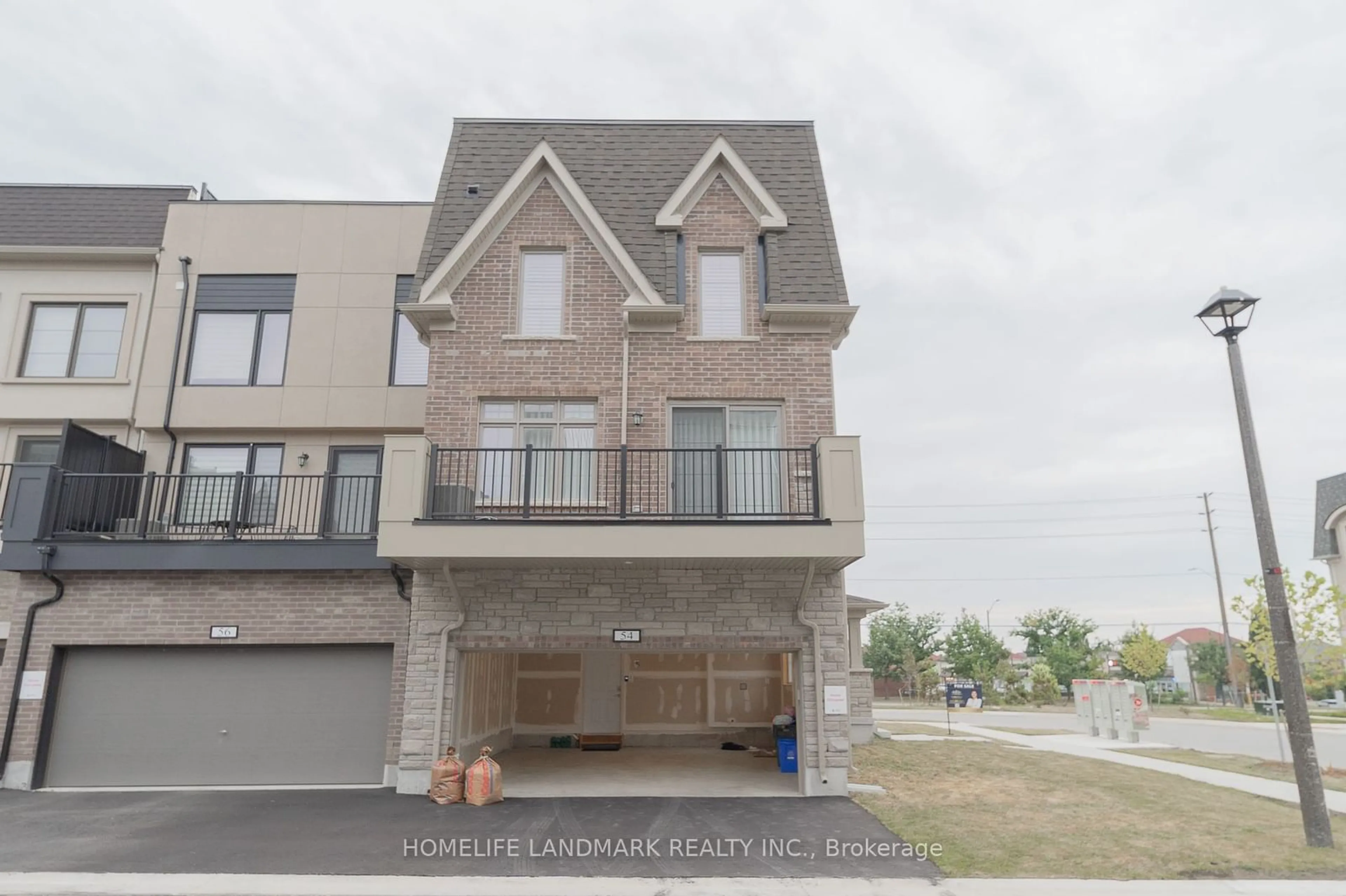 A pic from exterior of the house or condo, the street view for 54 Guardhouse Cres, Markham Ontario L6C 3J8