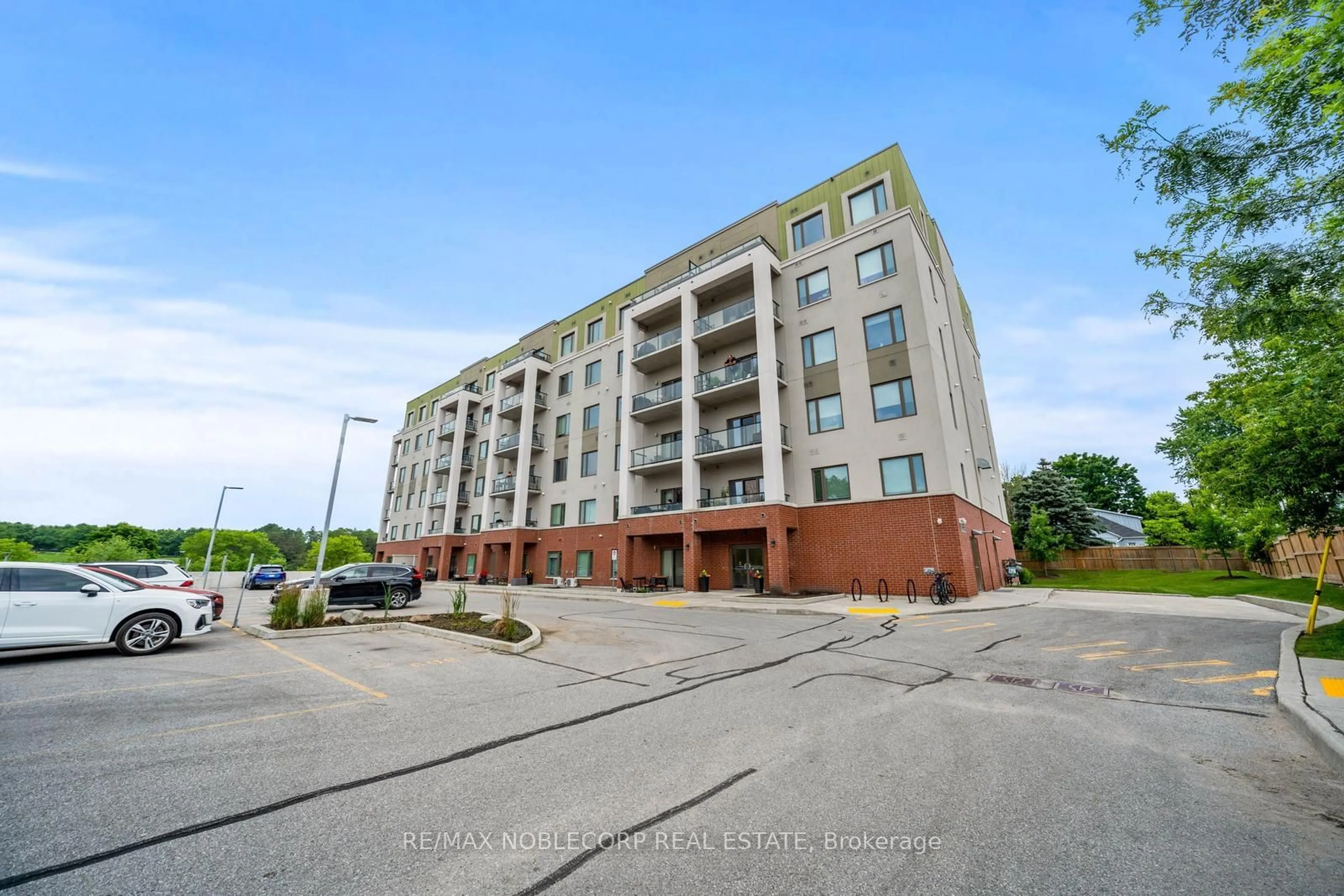 A pic from exterior of the house or condo, the front or back of building for 64 Queen St #201, New Tecumseth Ontario L0G 1W0