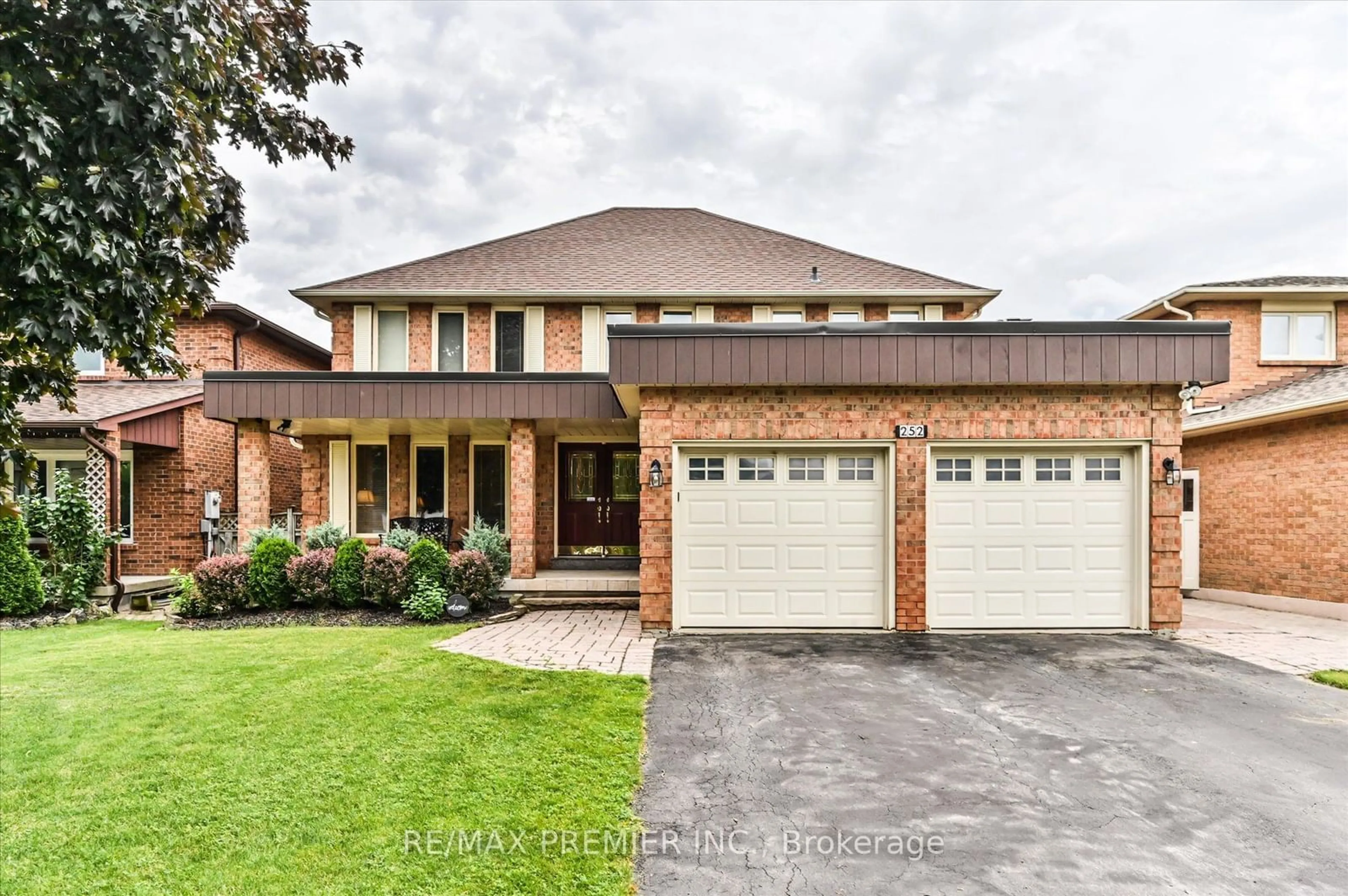 Home with brick exterior material for 252 Triton Ave, Vaughan Ontario L4L 6R1