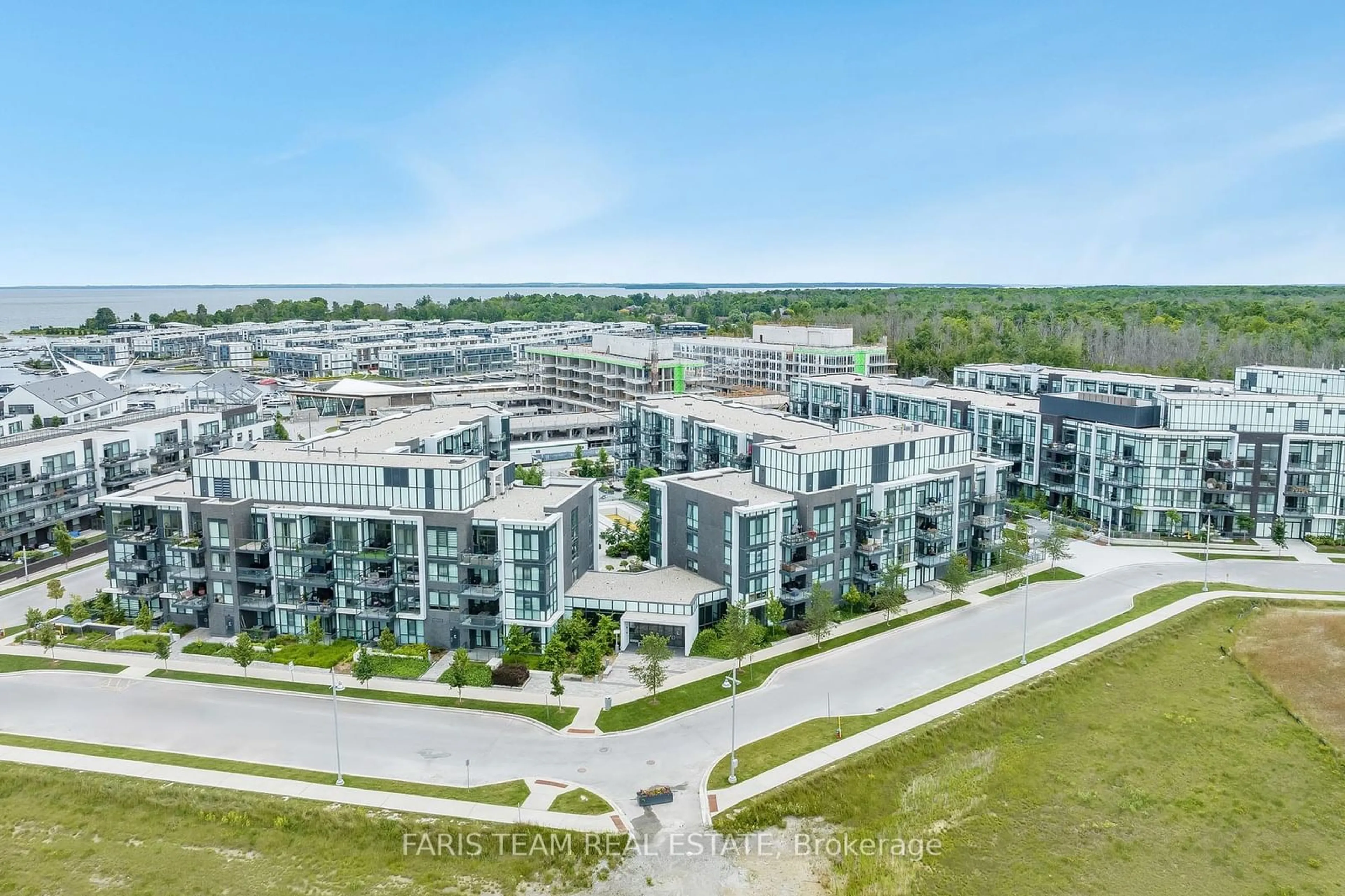 A pic from exterior of the house or condo, the view of city buildings for 375 Sea Ray Ave #139, Innisfil Ontario L9S 2P7