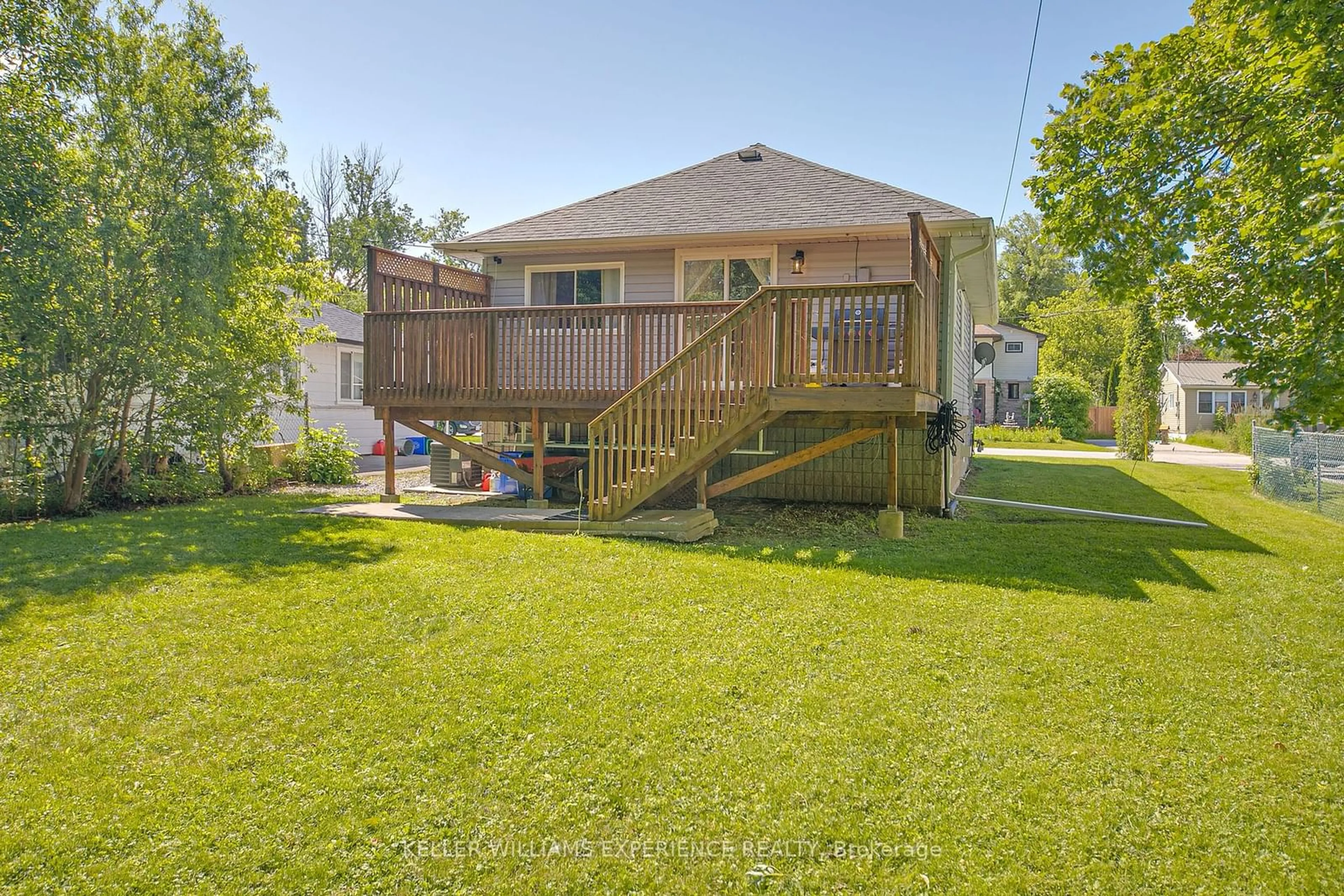 Frontside or backside of a home, the fenced backyard for 254 Parkway Ave, Georgina Ontario L4P 2V9