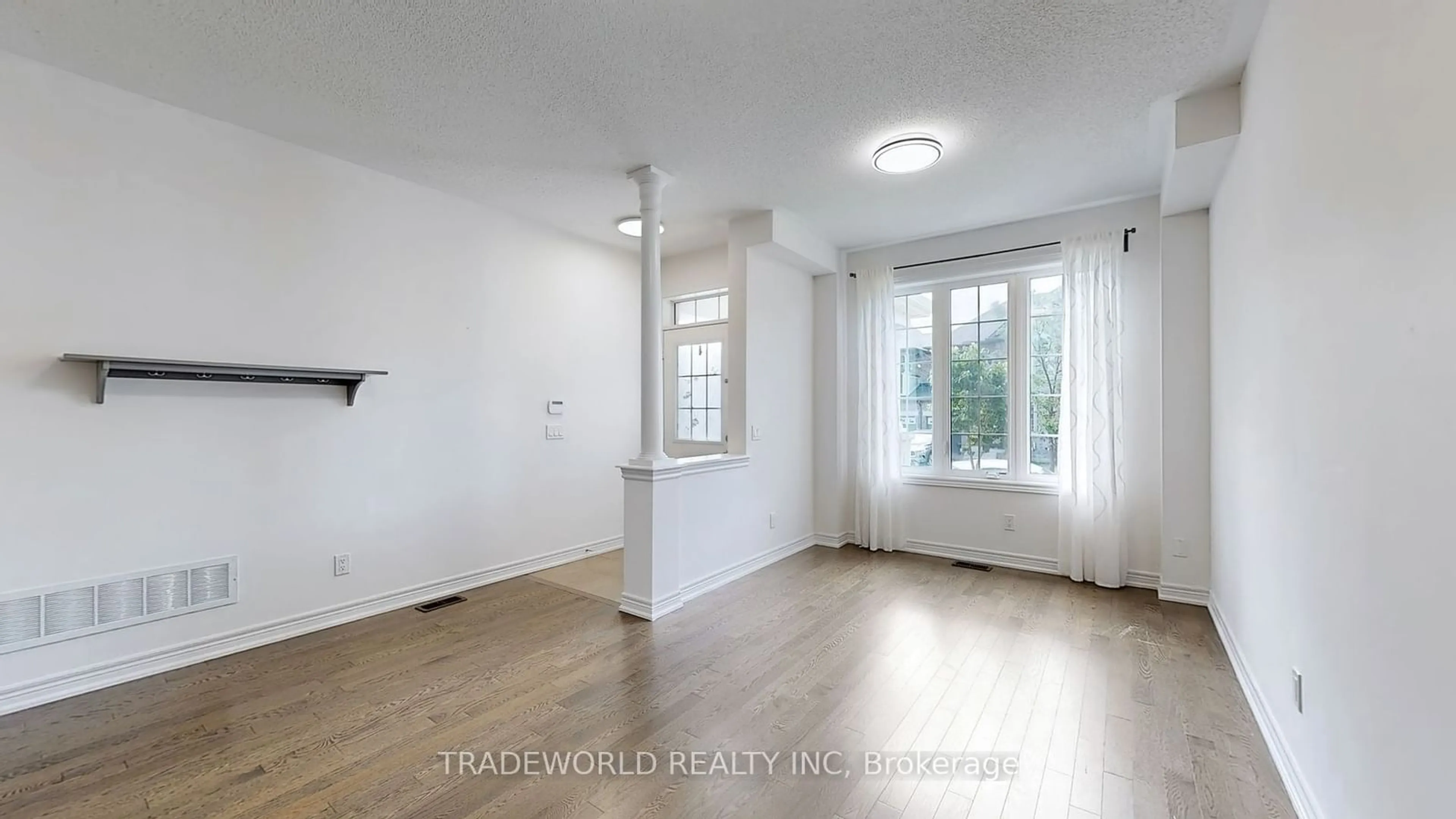 A pic of a room, wood floors for 12 Alatera Ave, Markham Ontario L6E 0M9