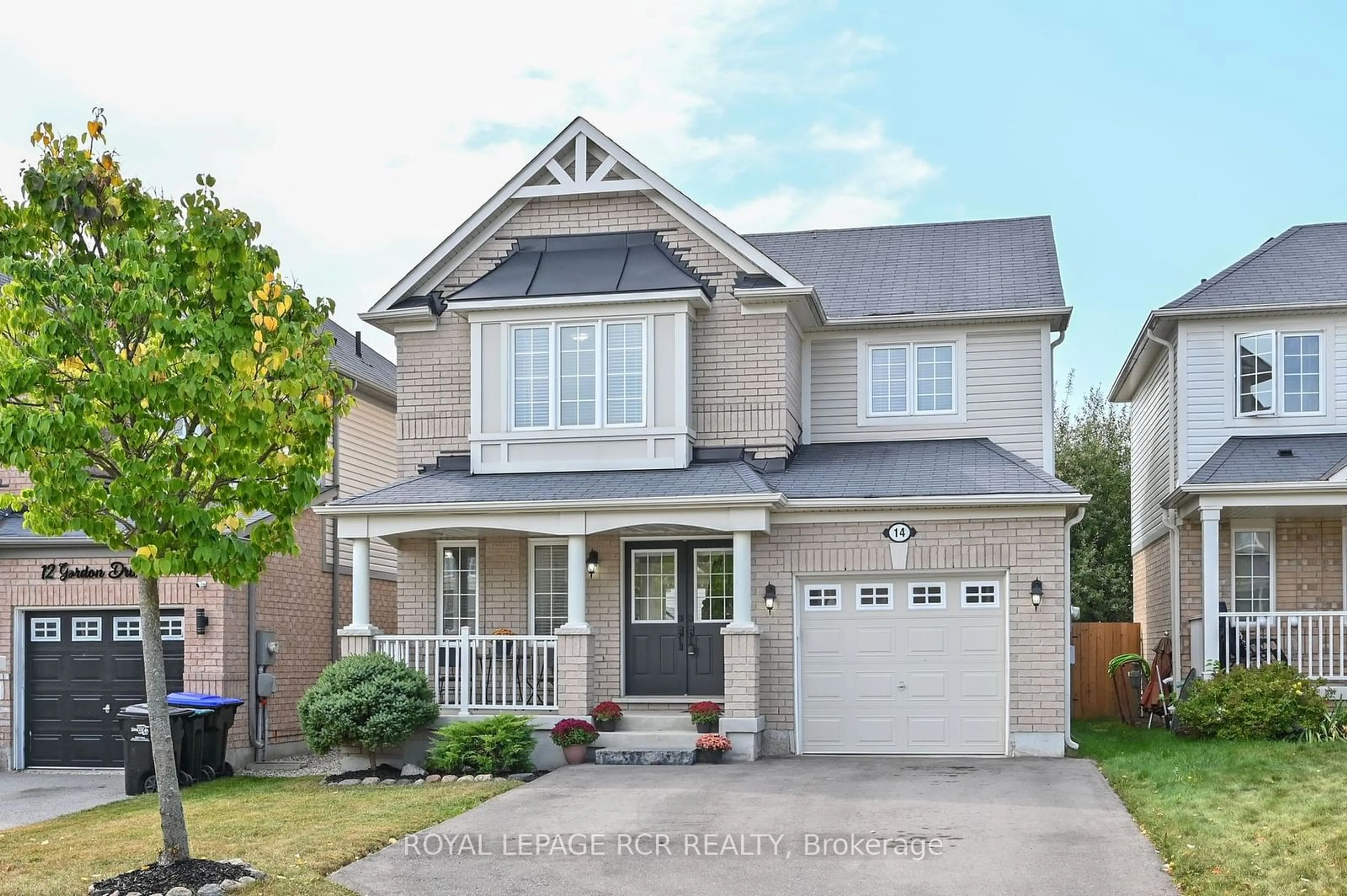 Frontside or backside of a home for 14 Gordon Dr, New Tecumseth Ontario L9R 0J1