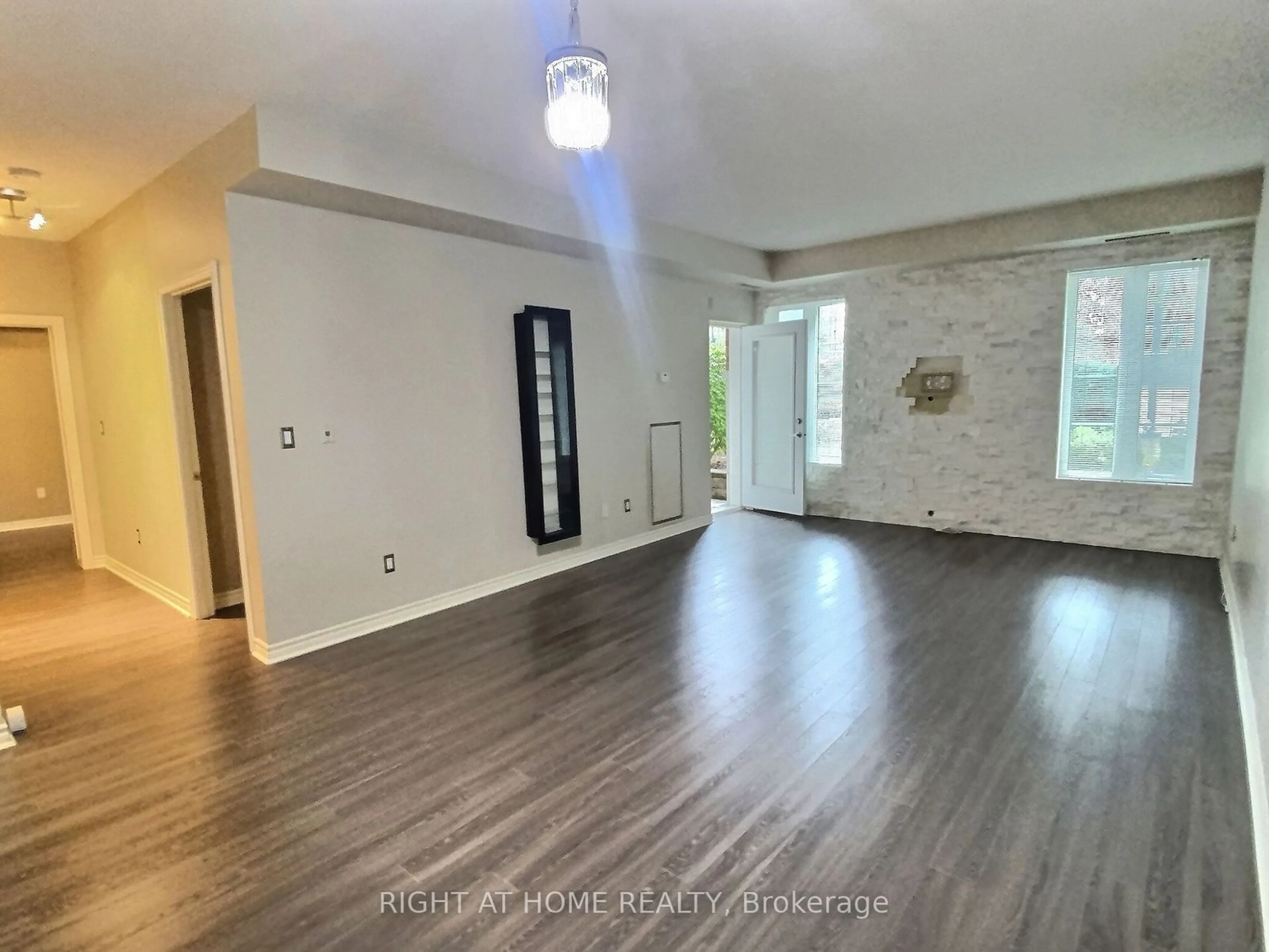 A pic of a room, wood floors for 4620 Highway 7 Rd ##107, Vaughan Ontario L4L 0B3