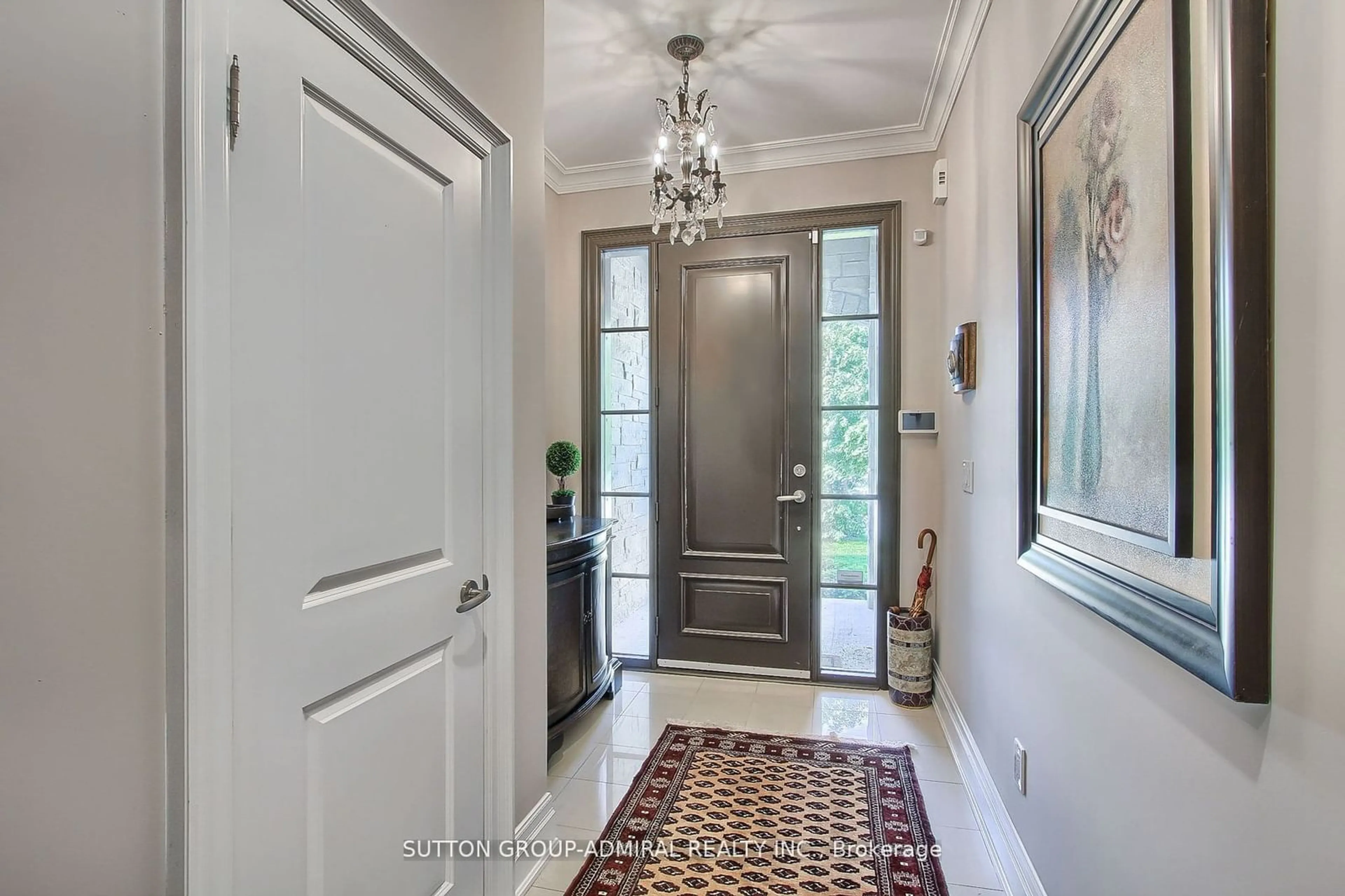 Indoor entryway, wood floors for 52 Jenny Thompson Crt, Richmond Hill Ontario L4S 0E7