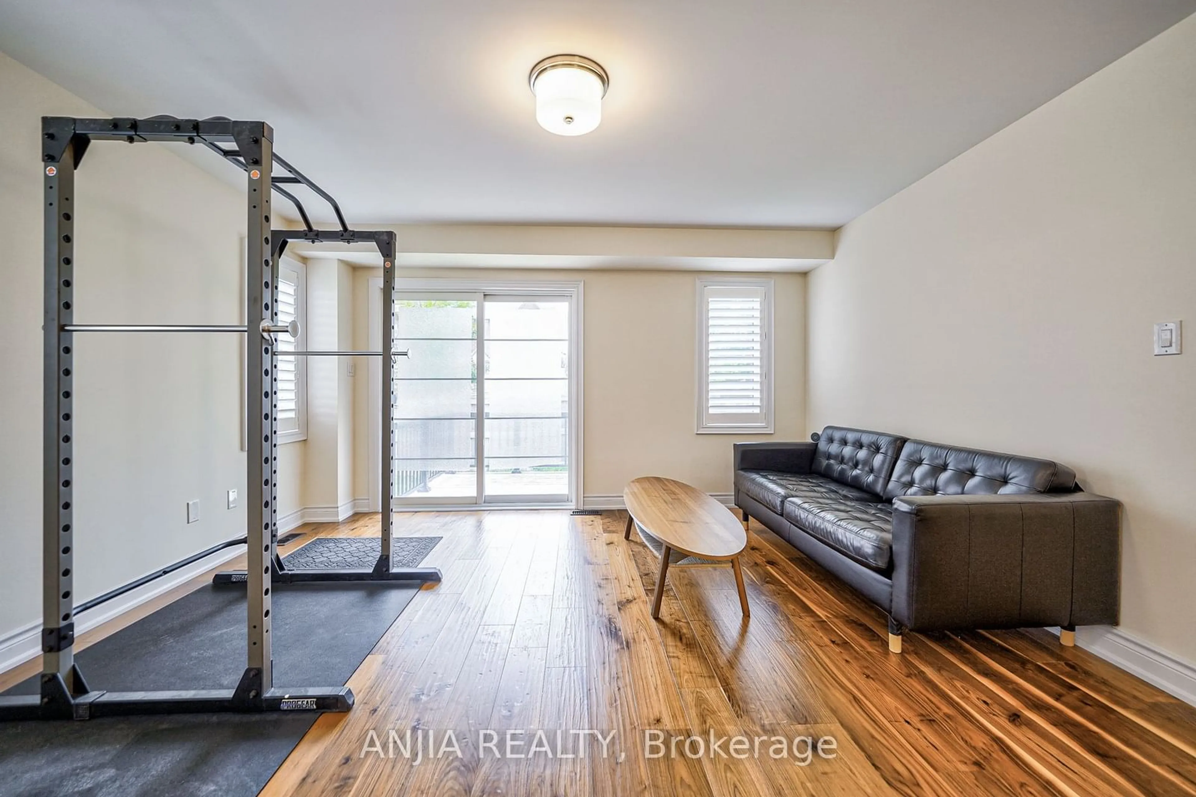 Gym or fitness room, wood floors for 26 Island Green Lane, Markham Ontario L6C 0Y7