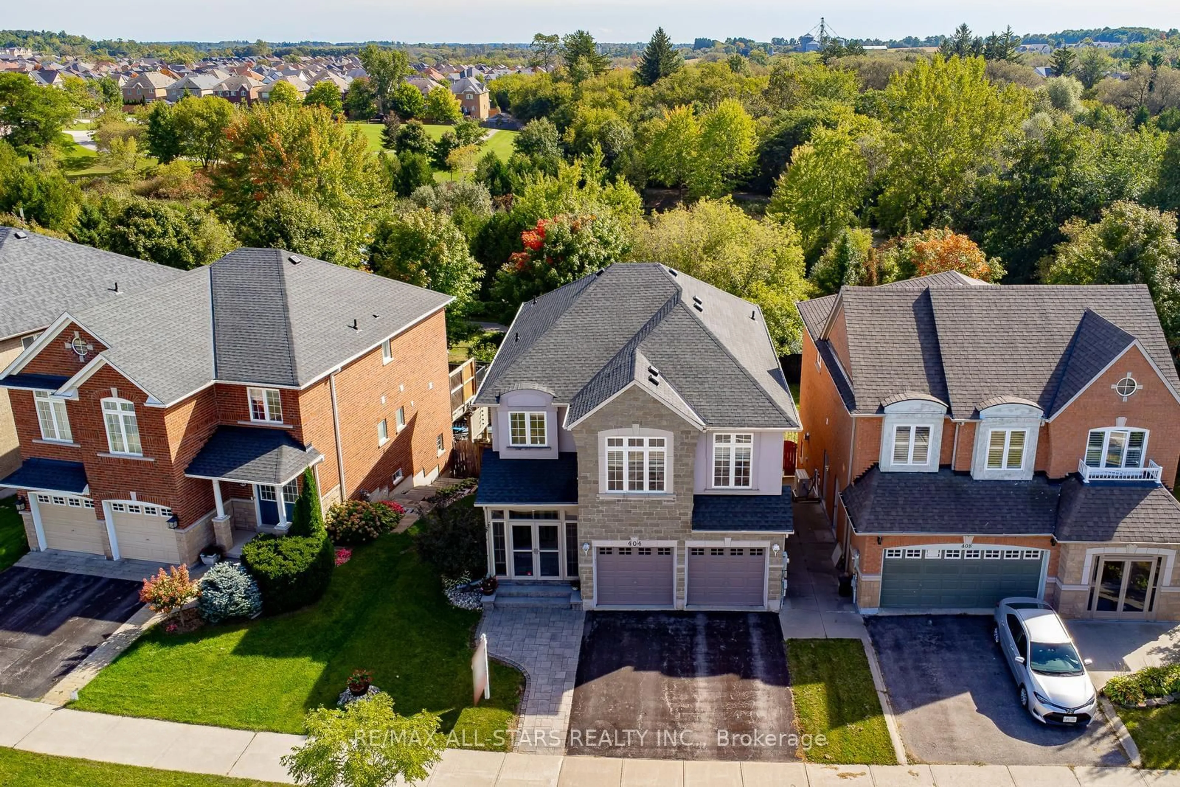 Frontside or backside of a home for 404 Hoover Park Dr, Whitchurch-Stouffville Ontario L4A 1P4