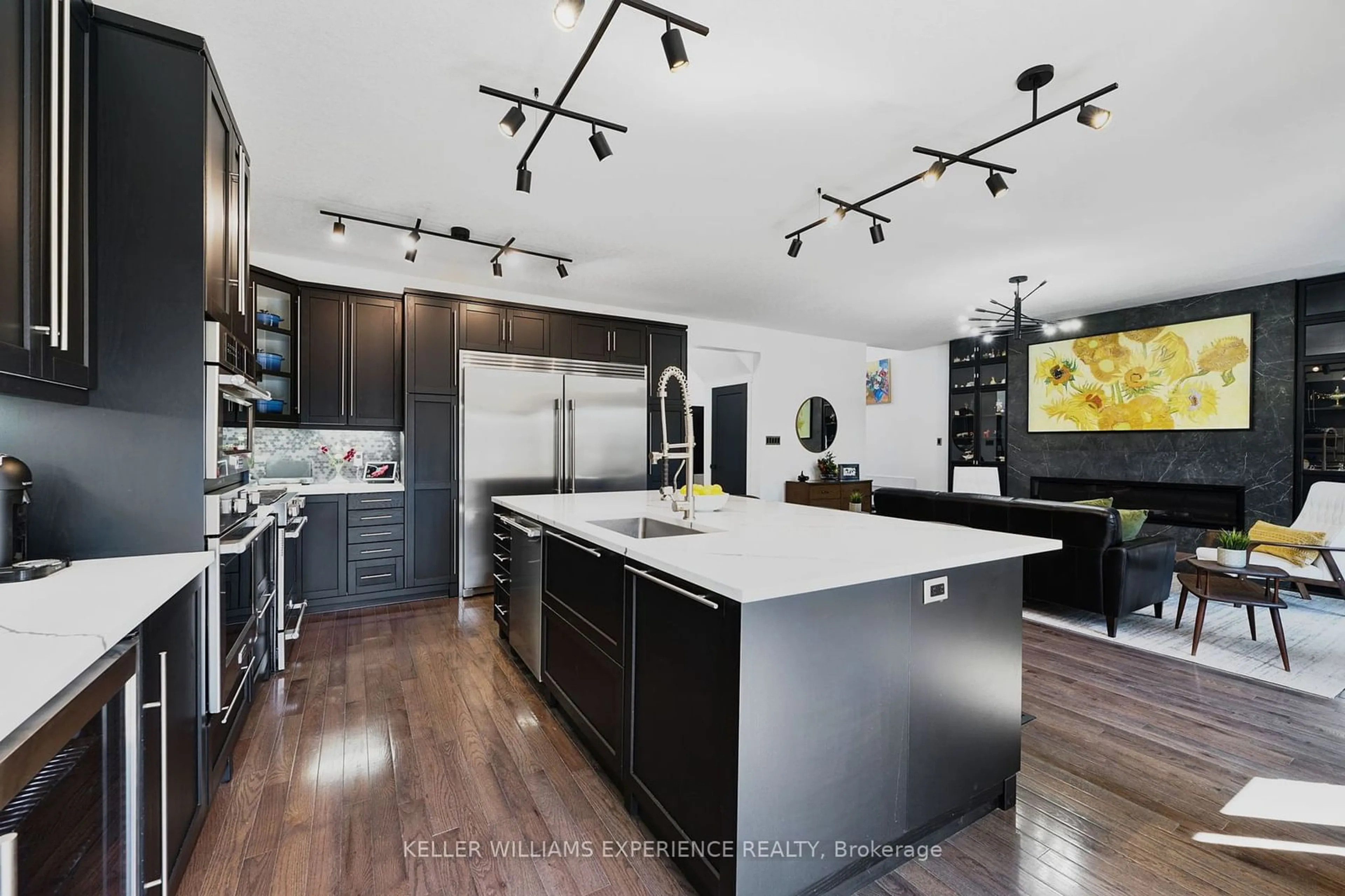 Contemporary kitchen, wood floors for 20 Armeda Clow Cres, Essa Ontario L3W 0H7