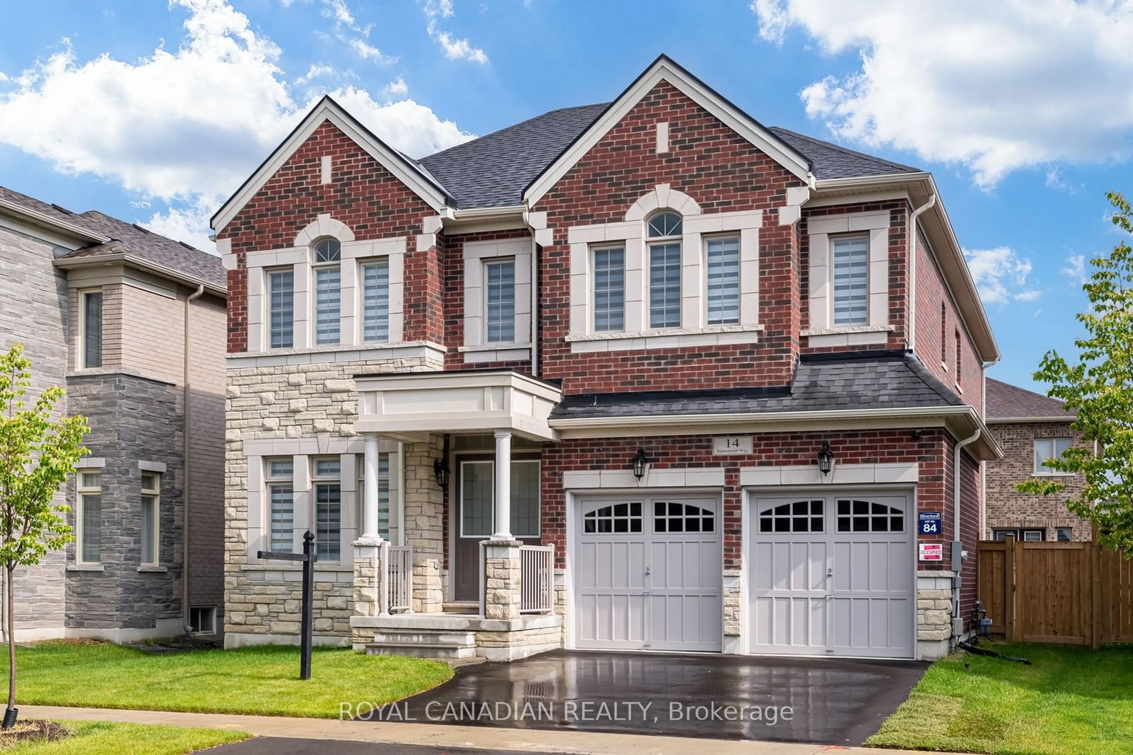 Home with brick exterior material for 14 Suttonrail Way, Whitchurch-Stouffville Ontario L4A 4X5