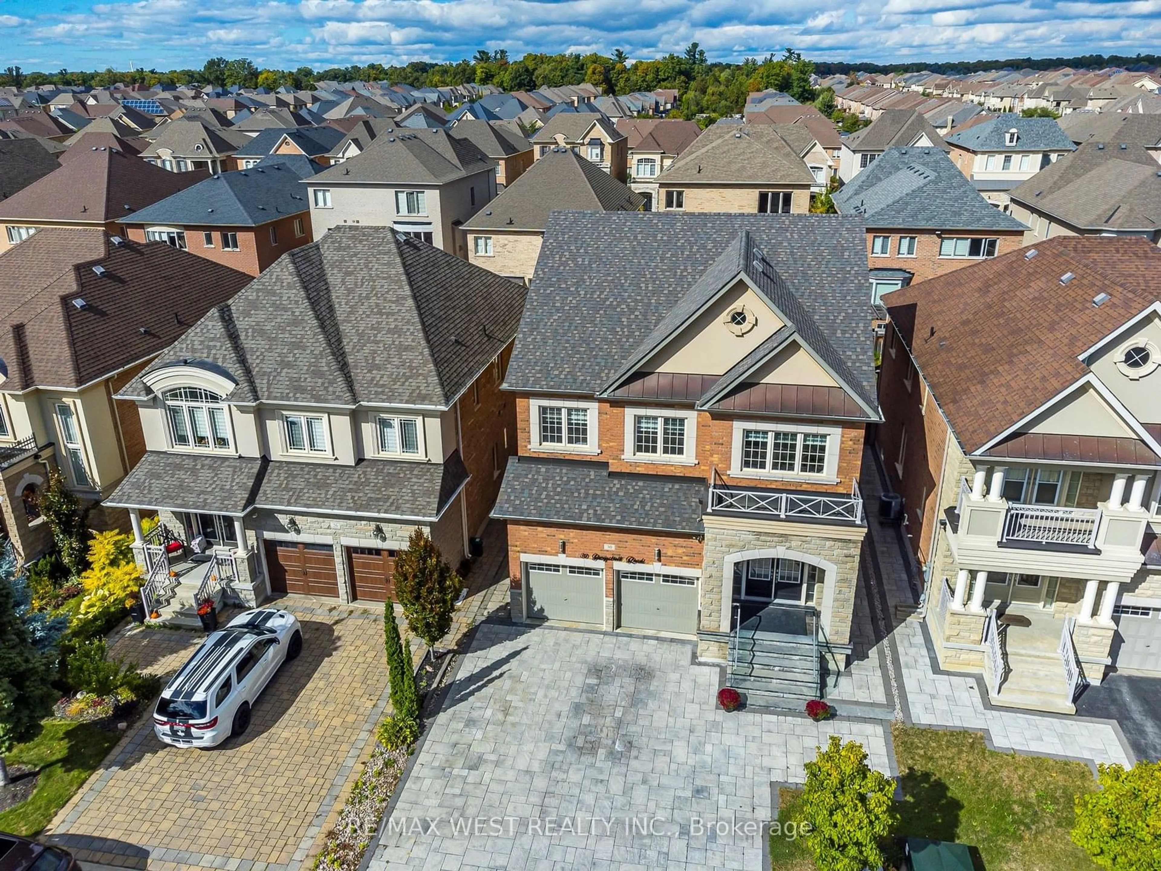 Frontside or backside of a home, the street view for 30 Garyscholl Rd, Vaughan Ontario L4L 1A6