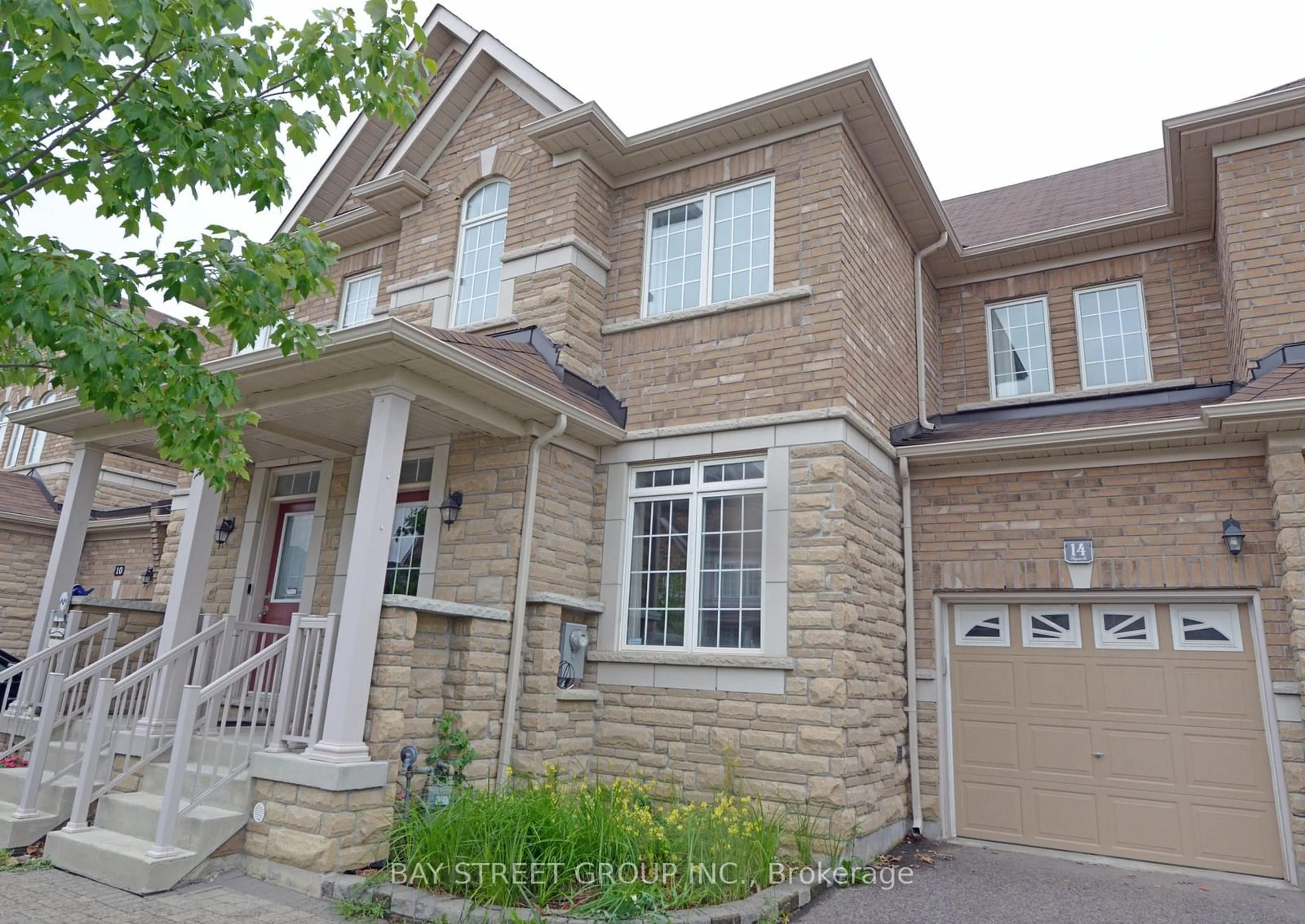 Frontside or backside of a home, the street view for 14 Begonia St, Markham Ontario L6E 0N3