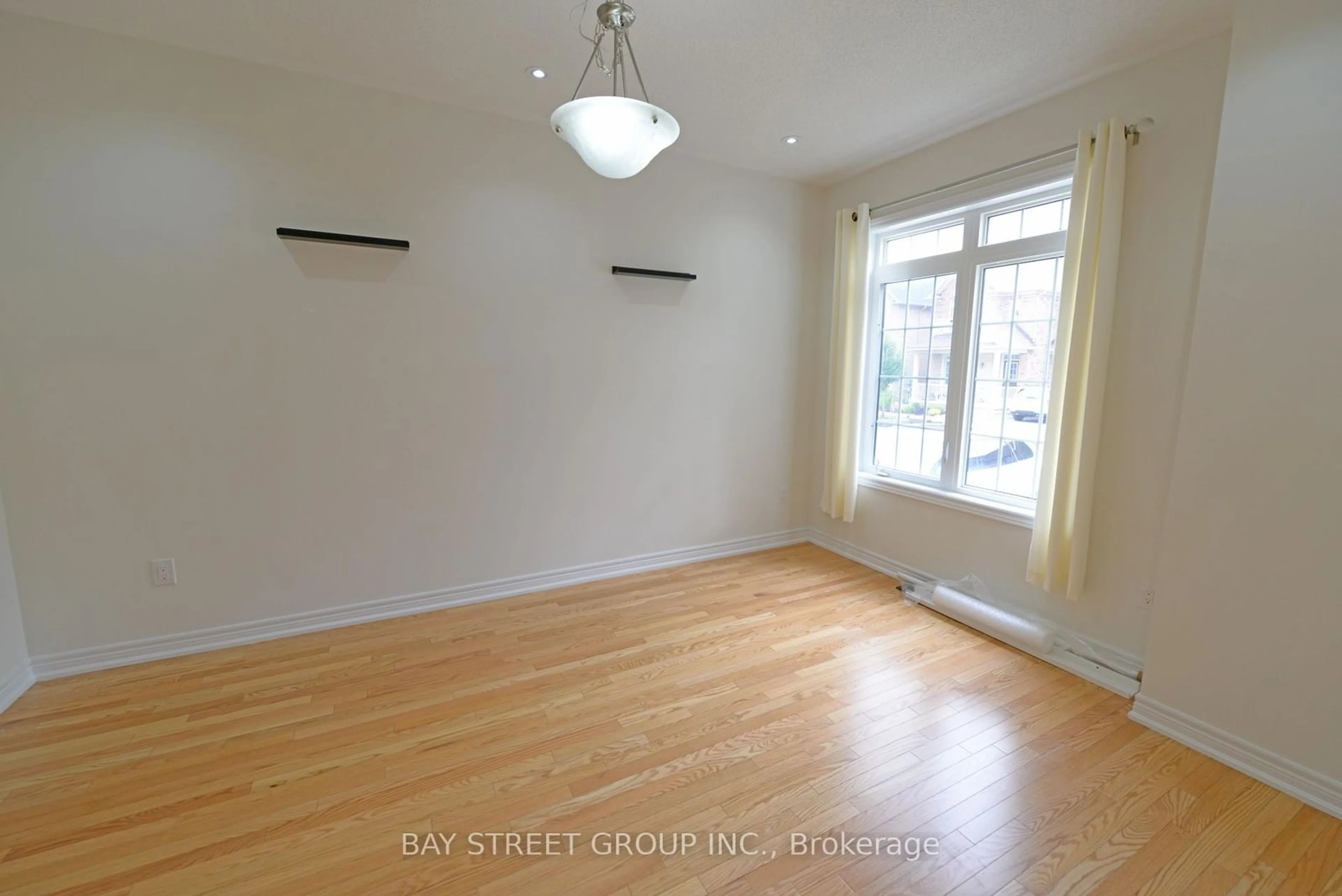 A pic of a room, wood floors for 14 Begonia St, Markham Ontario L6E 0N3