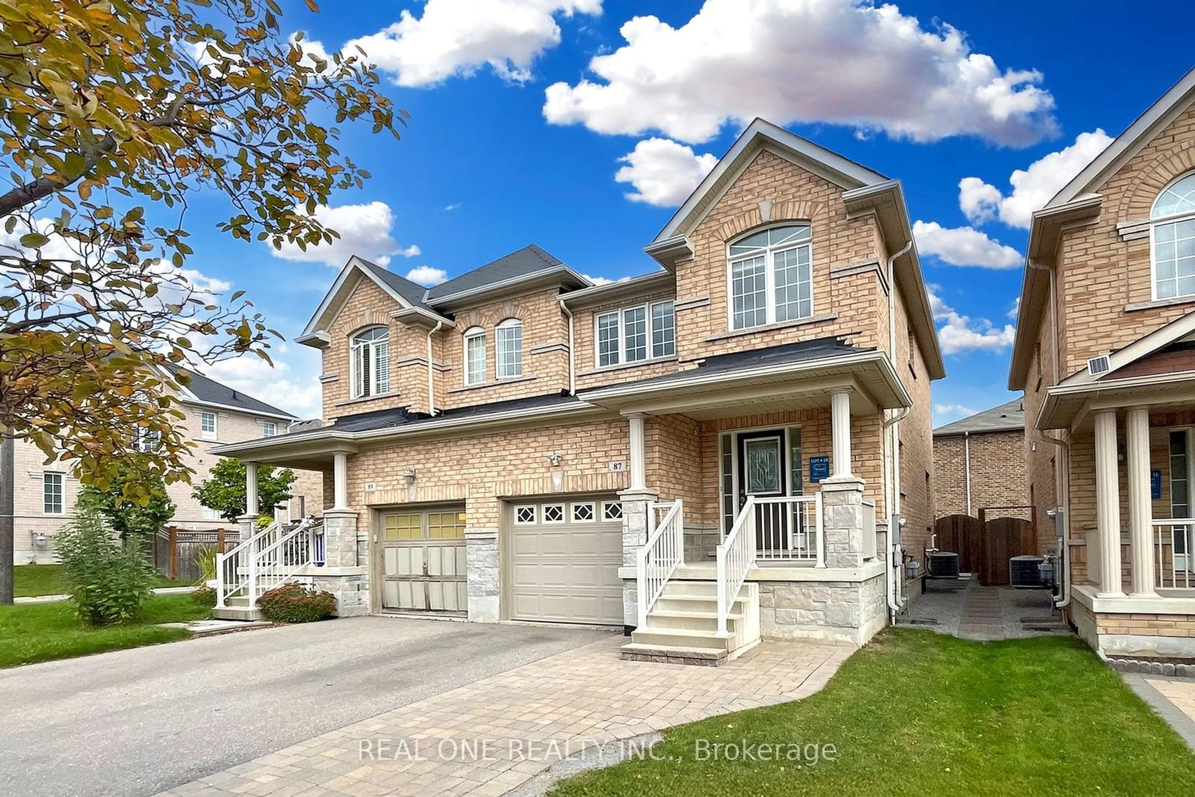 Frontside or backside of a home, the street view for 87 Harry Cook Dr, Markham Ontario L3R 5C3