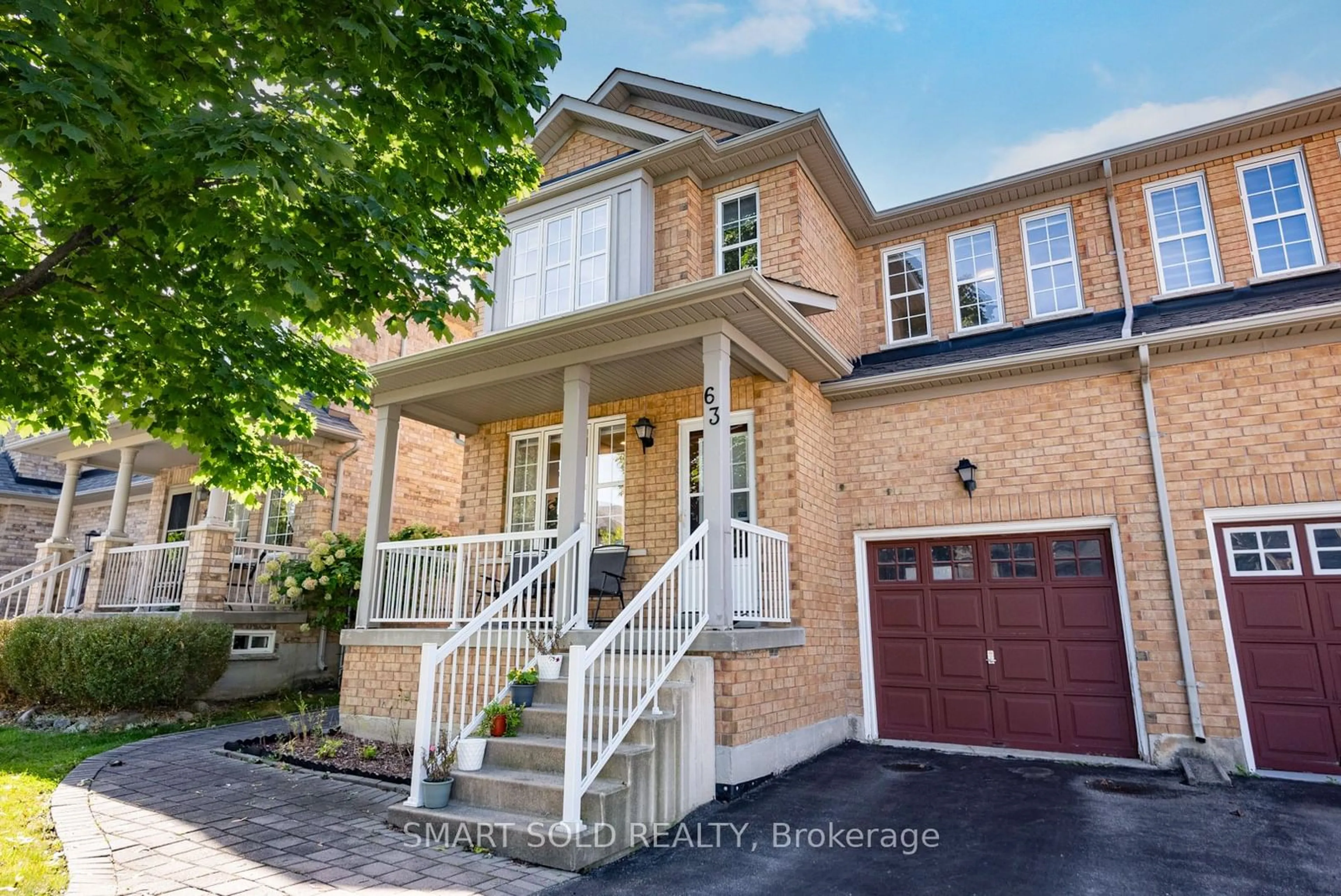 Home with brick exterior material for 63 Arundel Dr, Vaughan Ontario L4H 2W5