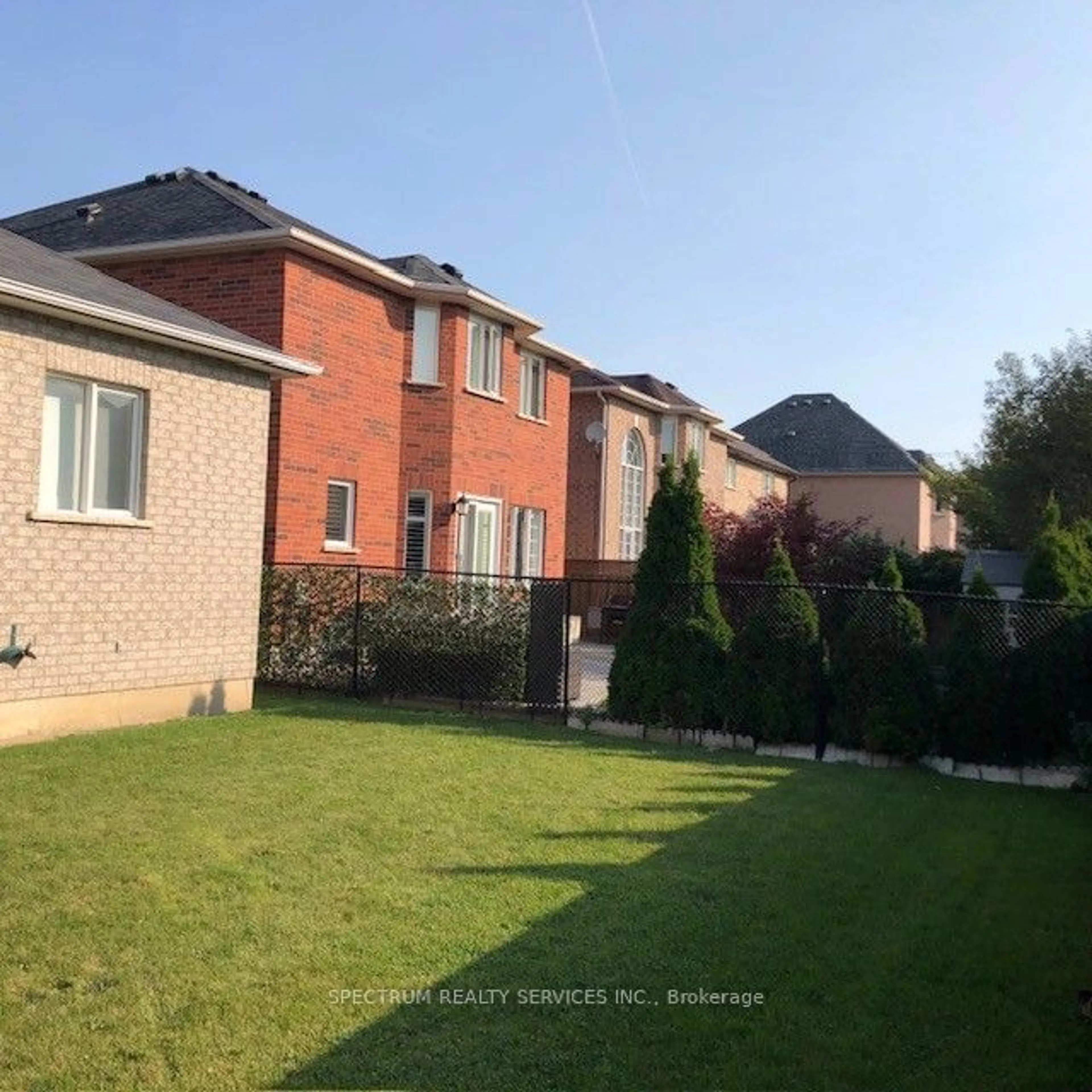 Frontside or backside of a home, the fenced backyard for 31 Coalbrook Crt, Vaughan Ontario L4L 9B7