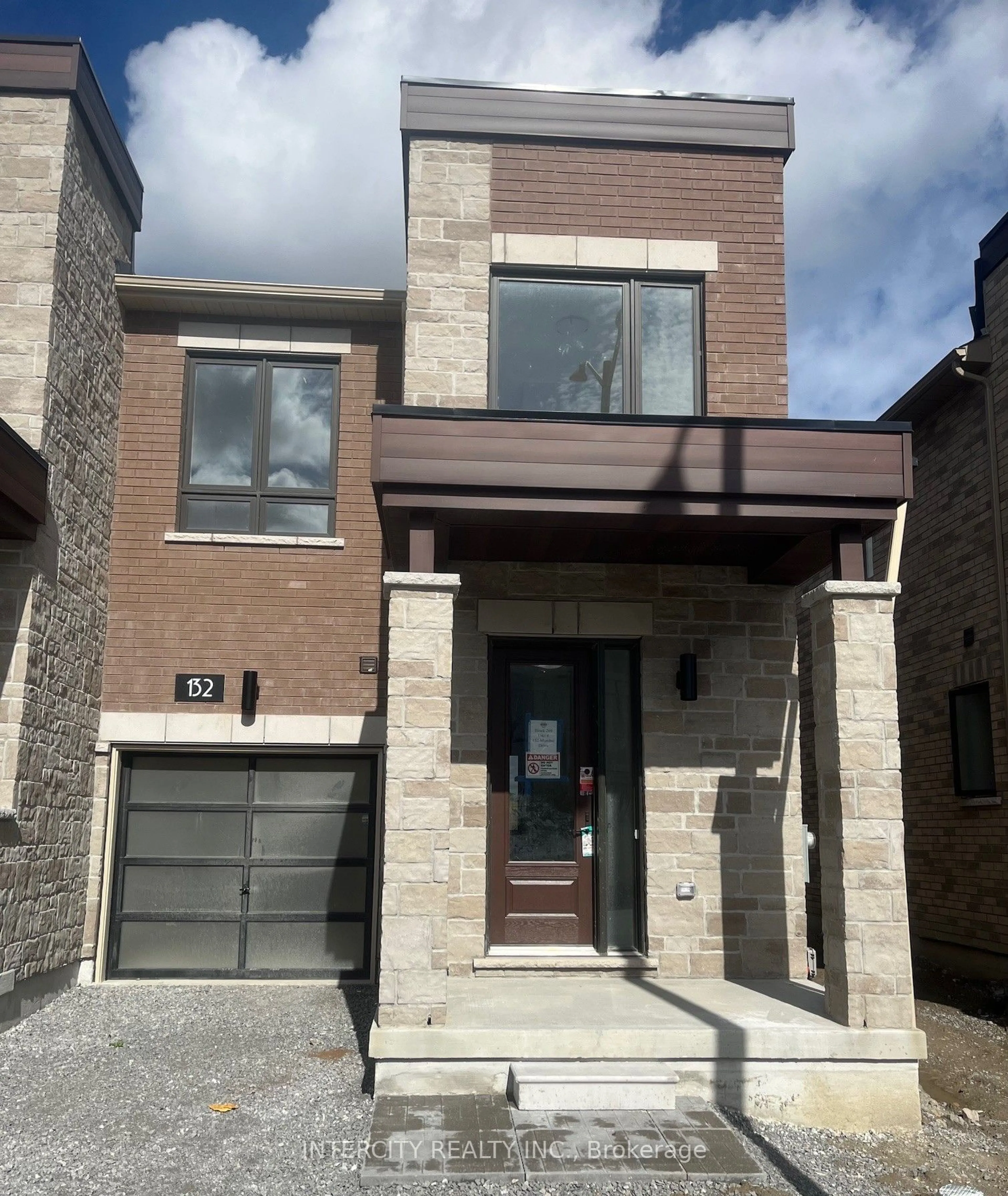 Home with brick exterior material for 132 Mumbai Dr, Markham Ontario L3S 3K5