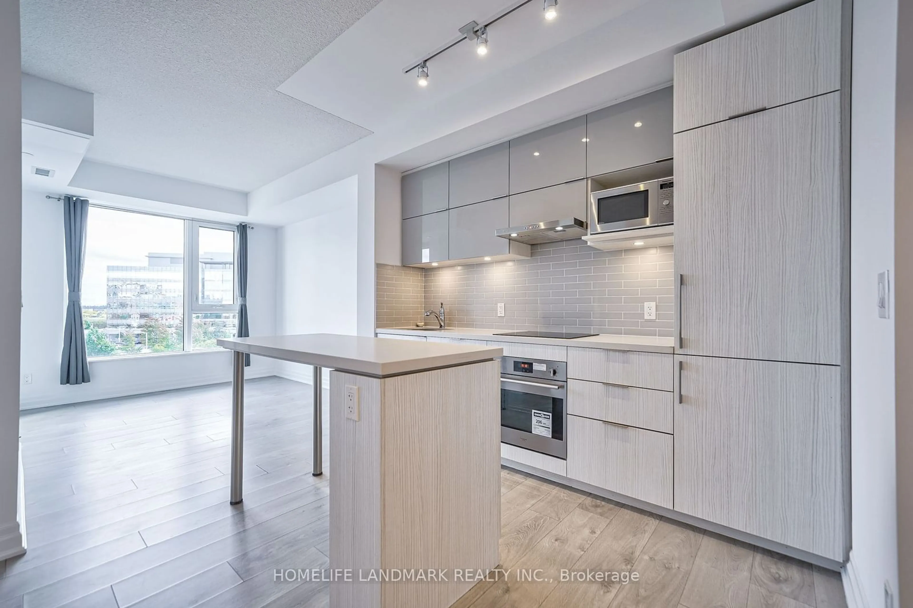 Open concept kitchen for 8 Rouge Valley Dr #509, Markham Ontario L6G 0G8