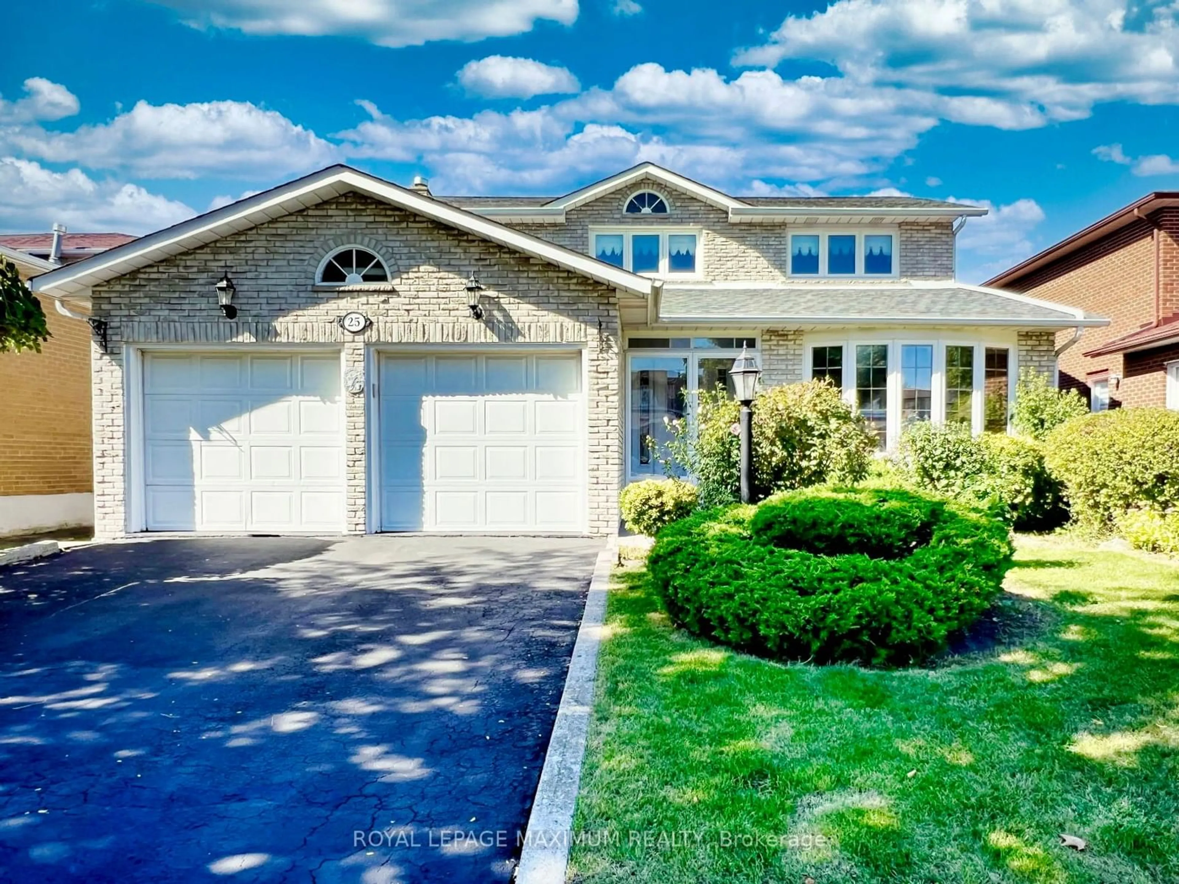 Frontside or backside of a home, cottage for 25 Risebrough Crct, Markham Ontario L3R 3B9