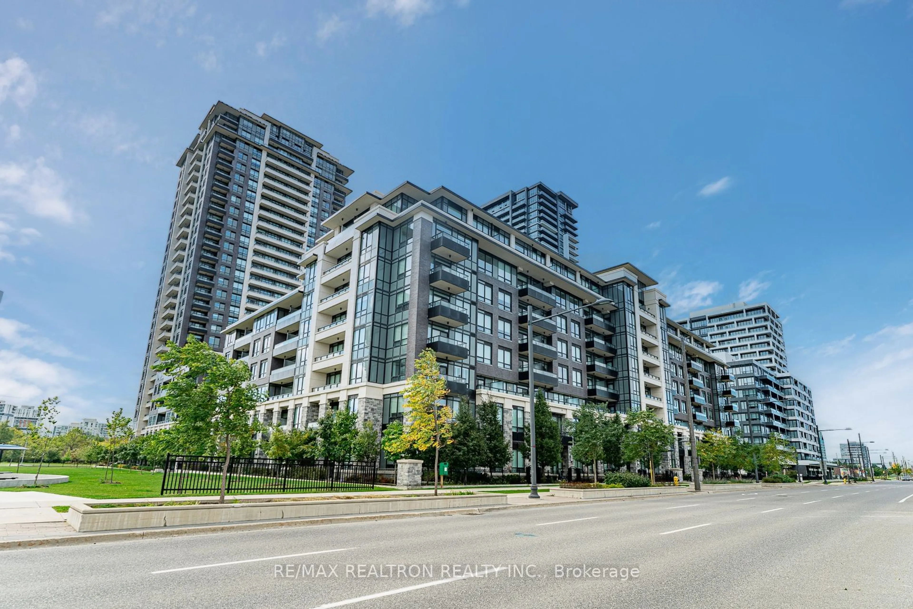 A pic from exterior of the house or condo, the street view for 25 Water Walk Dr #101, Markham Ontario L6G 0G3