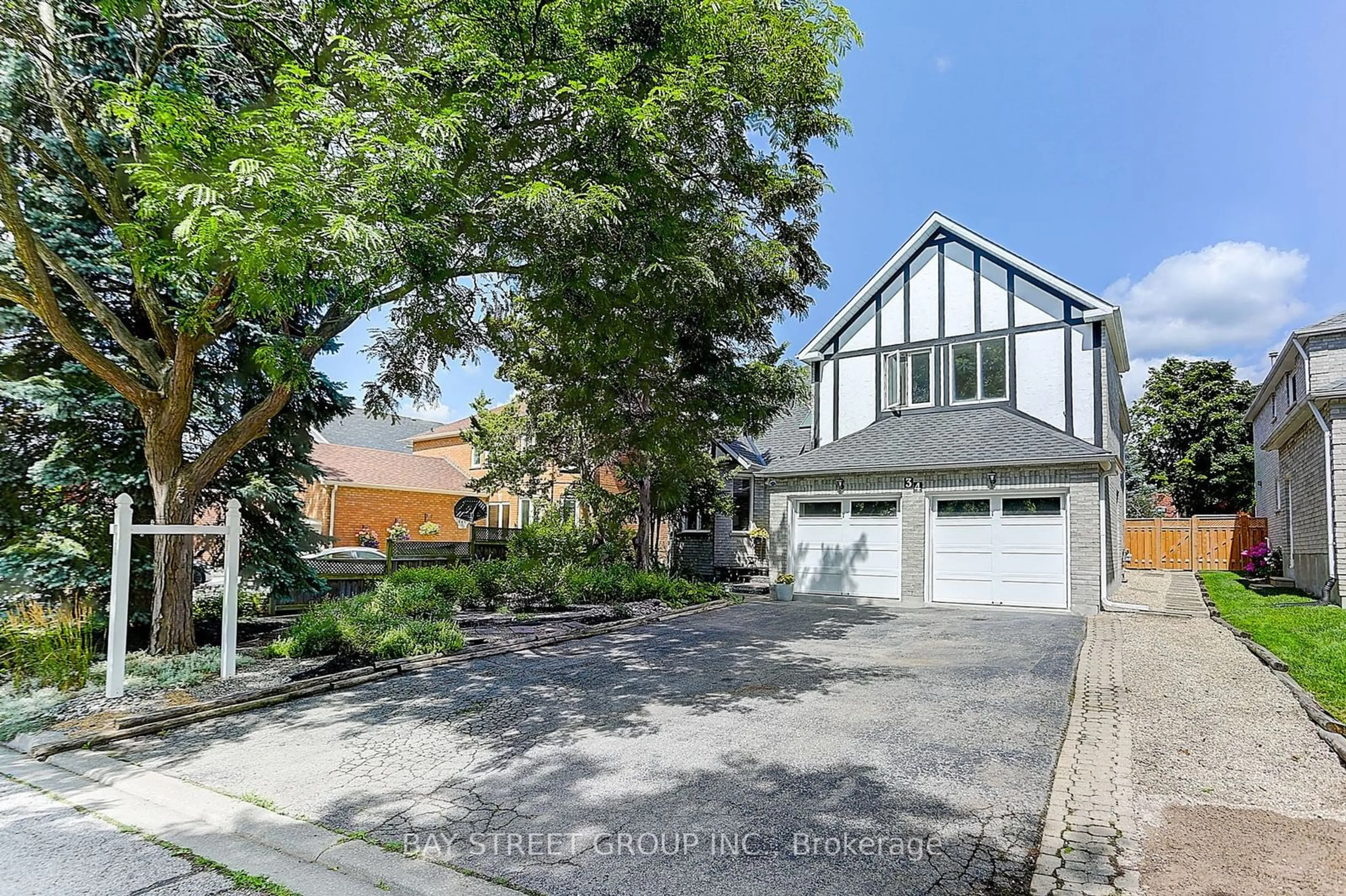 Frontside or backside of a home, the street view for 34 Brooklyn Cres, Markham Ontario L3P 7C3