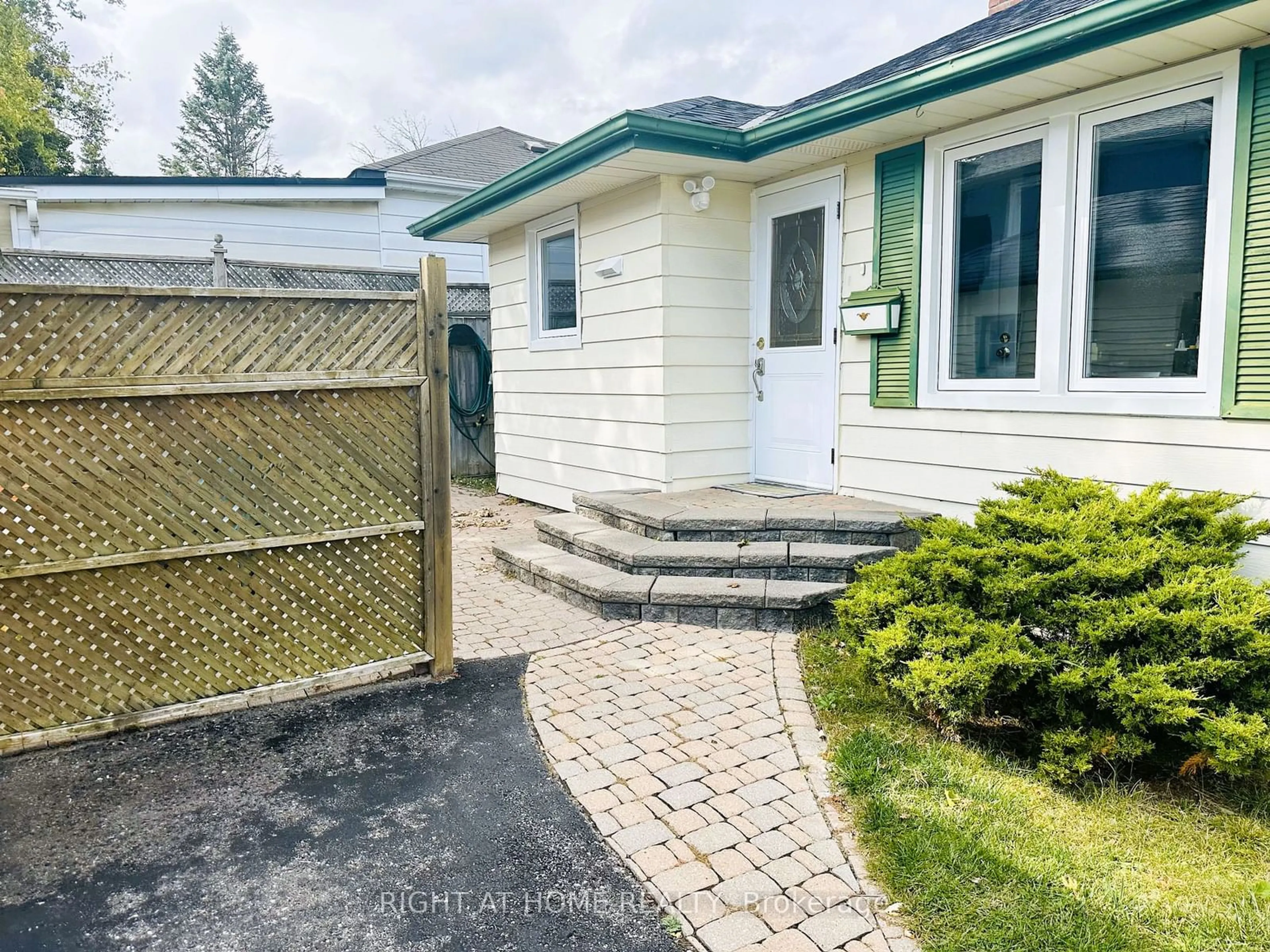 Frontside or backside of a home, the fenced backyard for 782 Gorham St, Newmarket Ontario L3Y 1L6