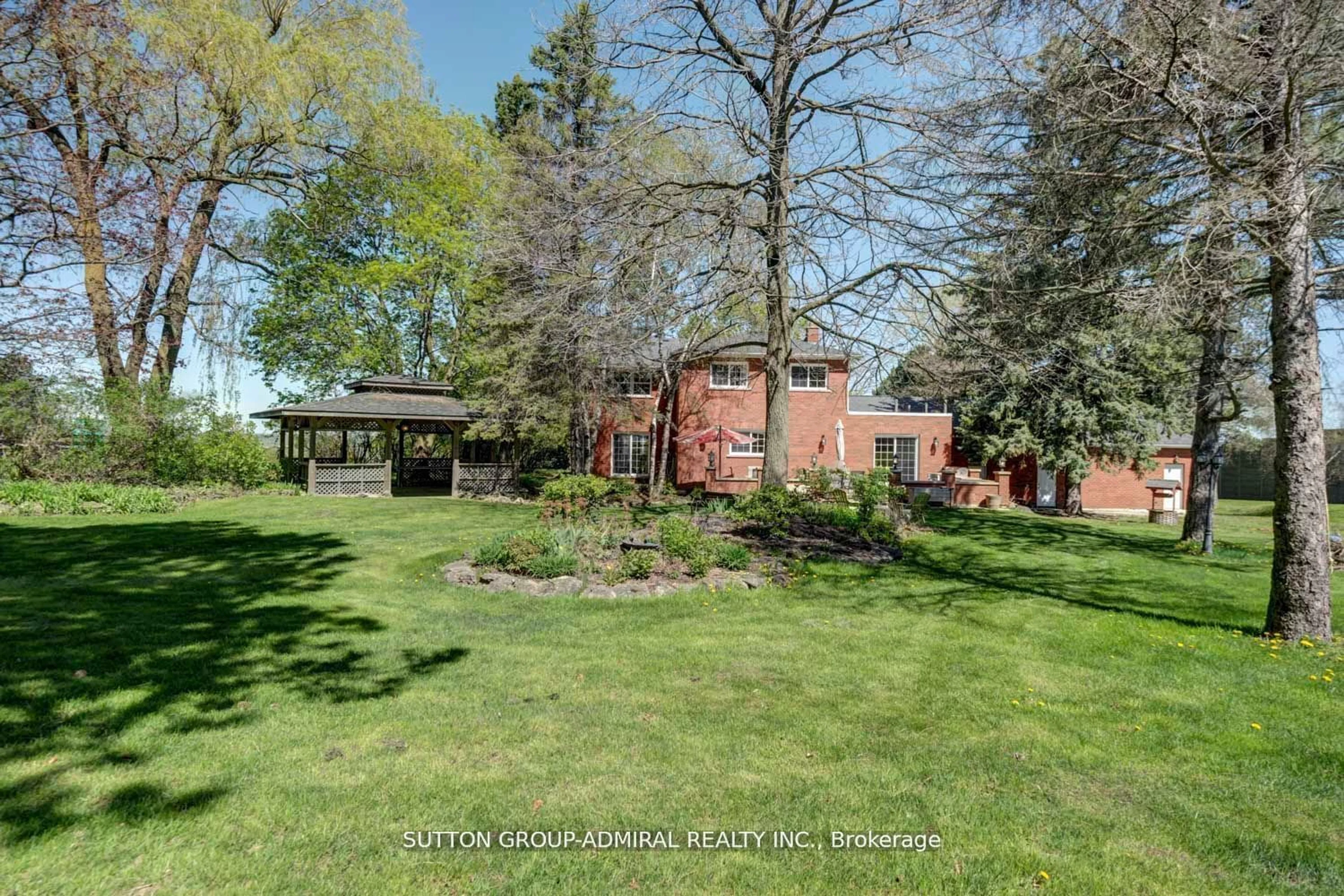 A pic from exterior of the house or condo, the fenced backyard for 3465 19TH SIDE ROAD Sdrd, King Ontario L7B 0C7