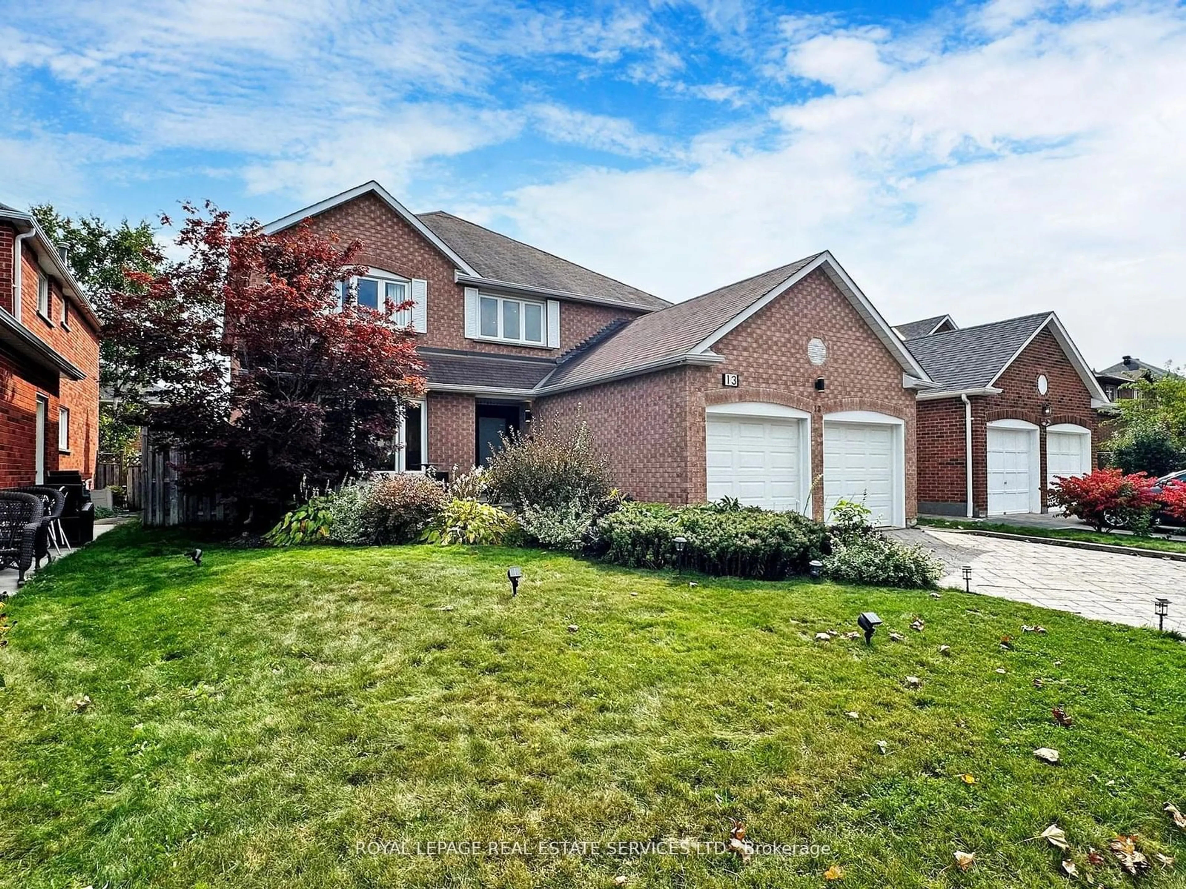 Frontside or backside of a home, the fenced backyard for 13 Beasley Dr, Richmond Hill Ontario L4C 7Z3