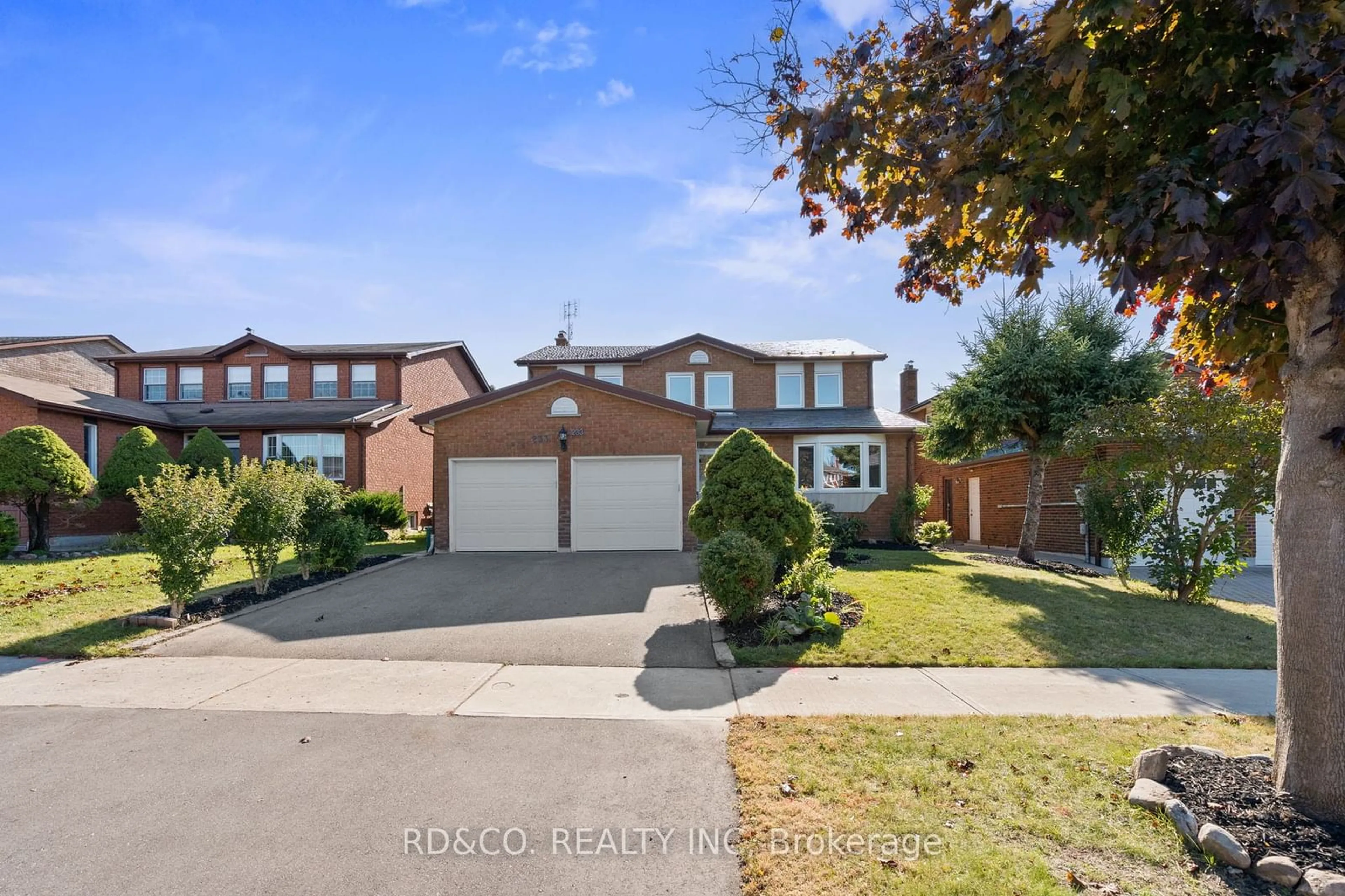 Frontside or backside of a home, the street view for 233 Raymerville Dr, Markham Ontario L3P 6S2