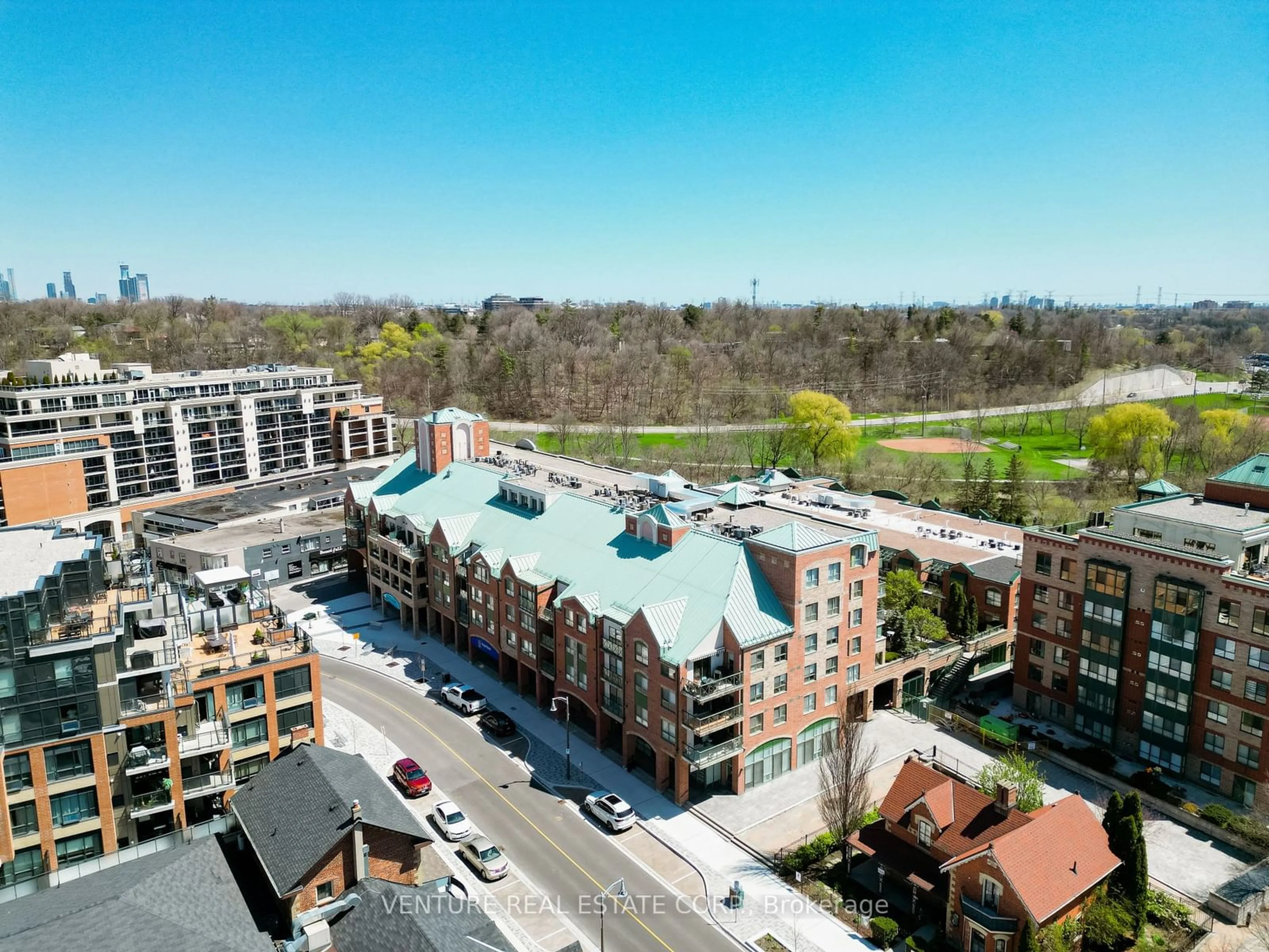 A pic from exterior of the house or condo, the view of city buildings for 121 Woodbridge Ave #312, Vaughan Ontario L4L 9E3