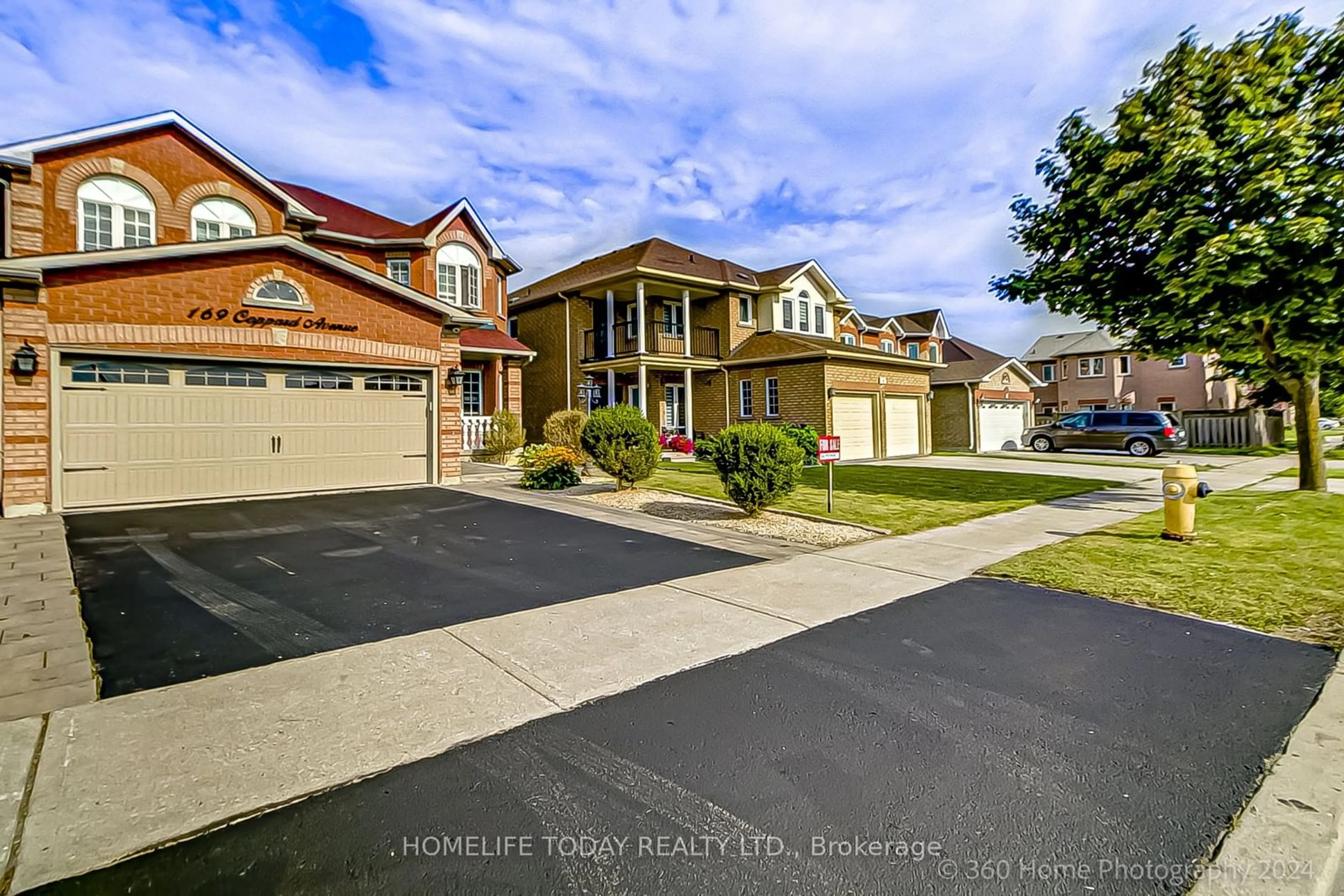 Frontside or backside of a home, the street view for 169 Coppard Ave, Markham Ontario L3S 3Z4