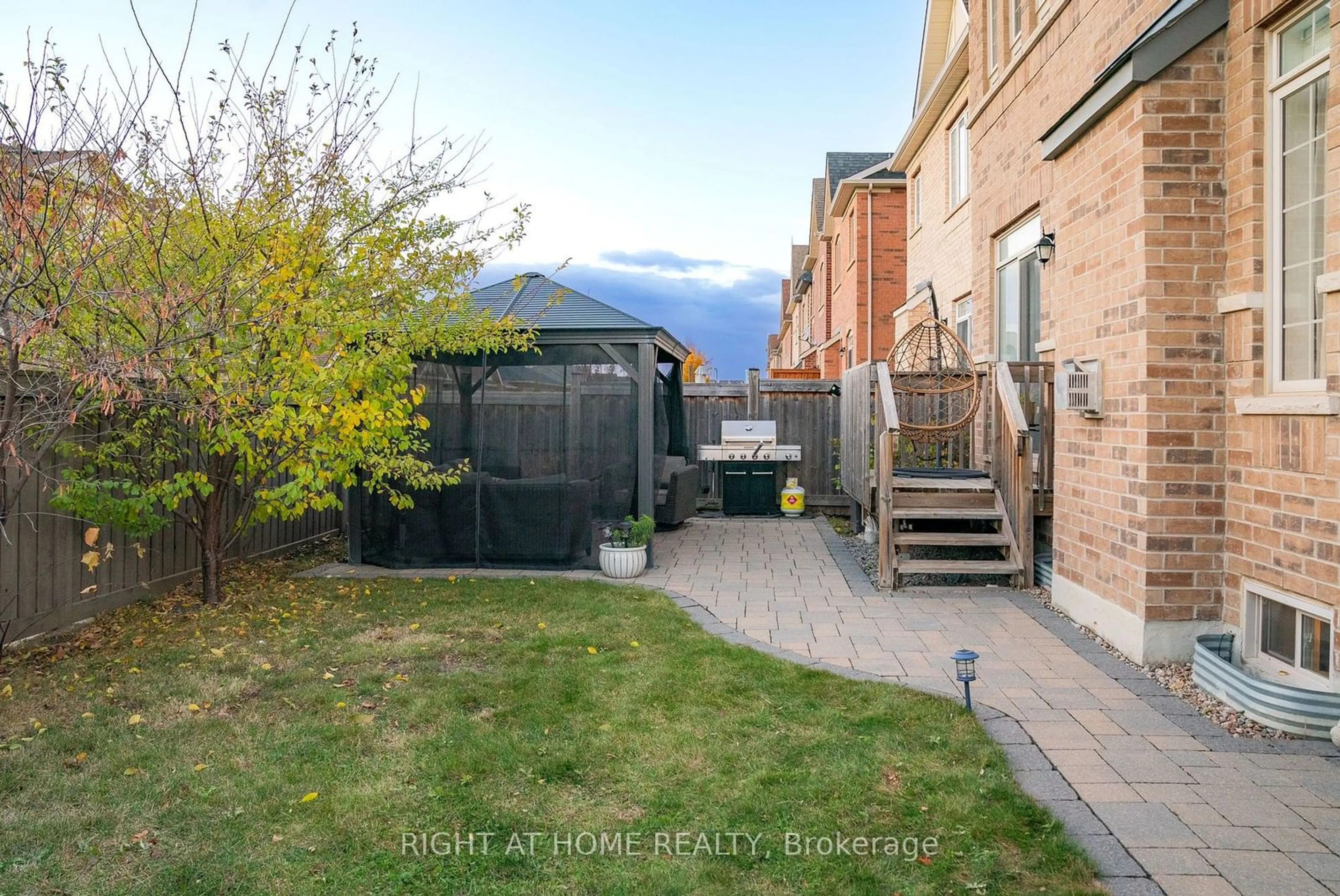 Patio, the fenced backyard for 152 Pelee Ave, Vaughan Ontario L4H 3Z9