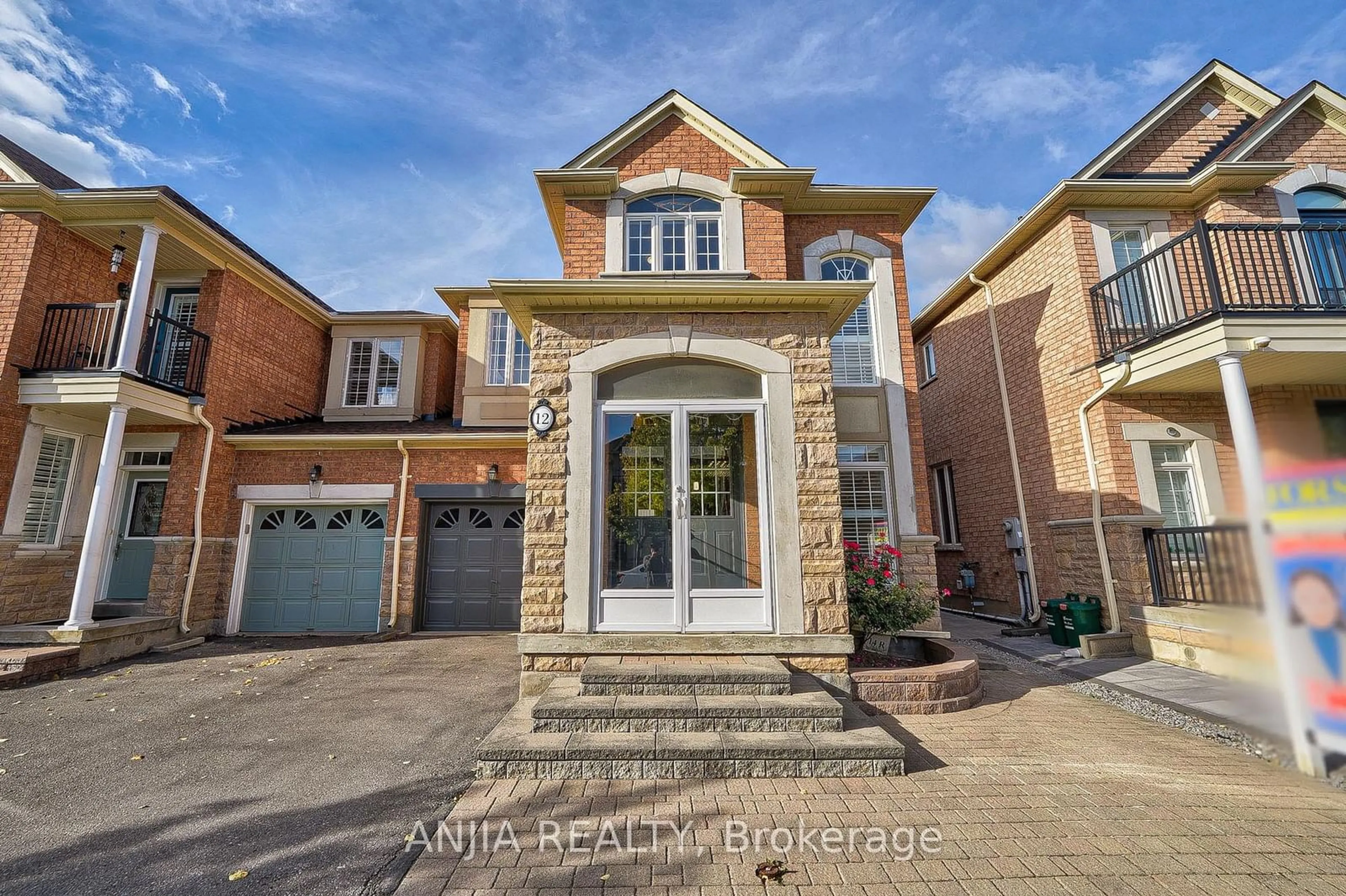 Home with brick exterior material for 12 Hermitage Blvd, Markham Ontario L6E 2H5