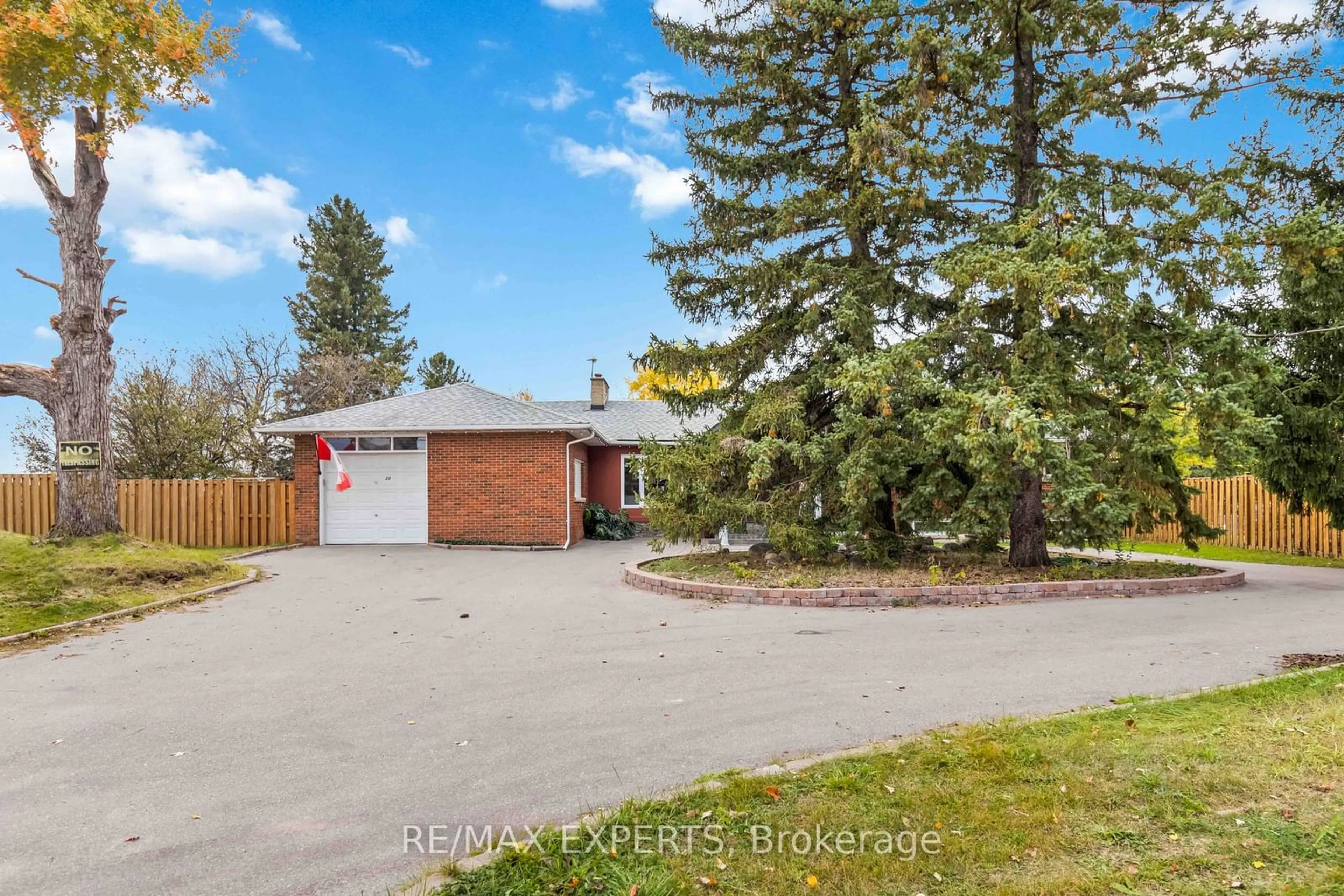 A pic from exterior of the house or condo, the fenced backyard for 20 Leonard Rd, King Ontario L0G 1T0