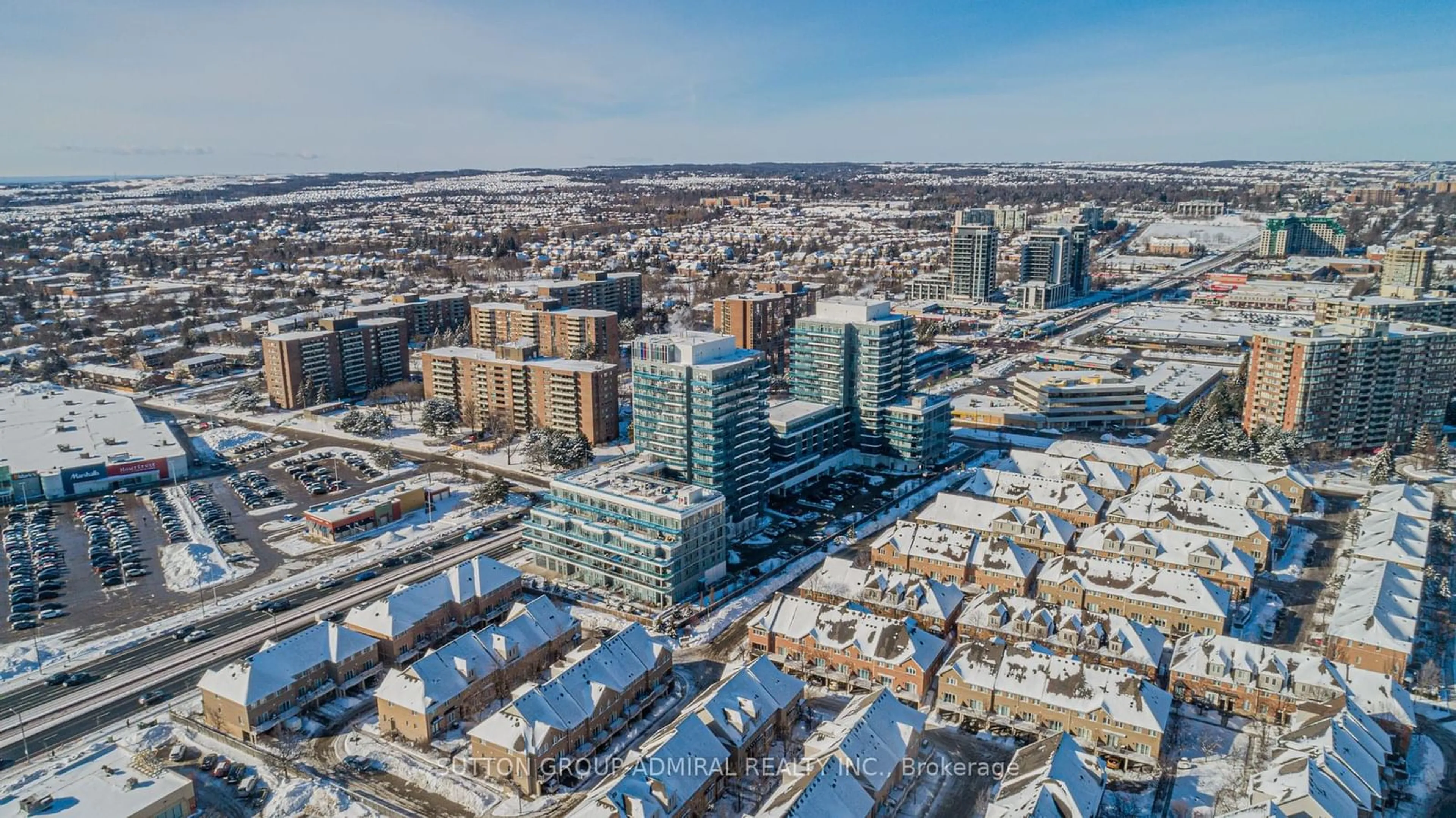 A pic from exterior of the house or condo, the view of city buildings for 9471 Yonge St #213, Richmond Hill Ontario L4C 0Z5