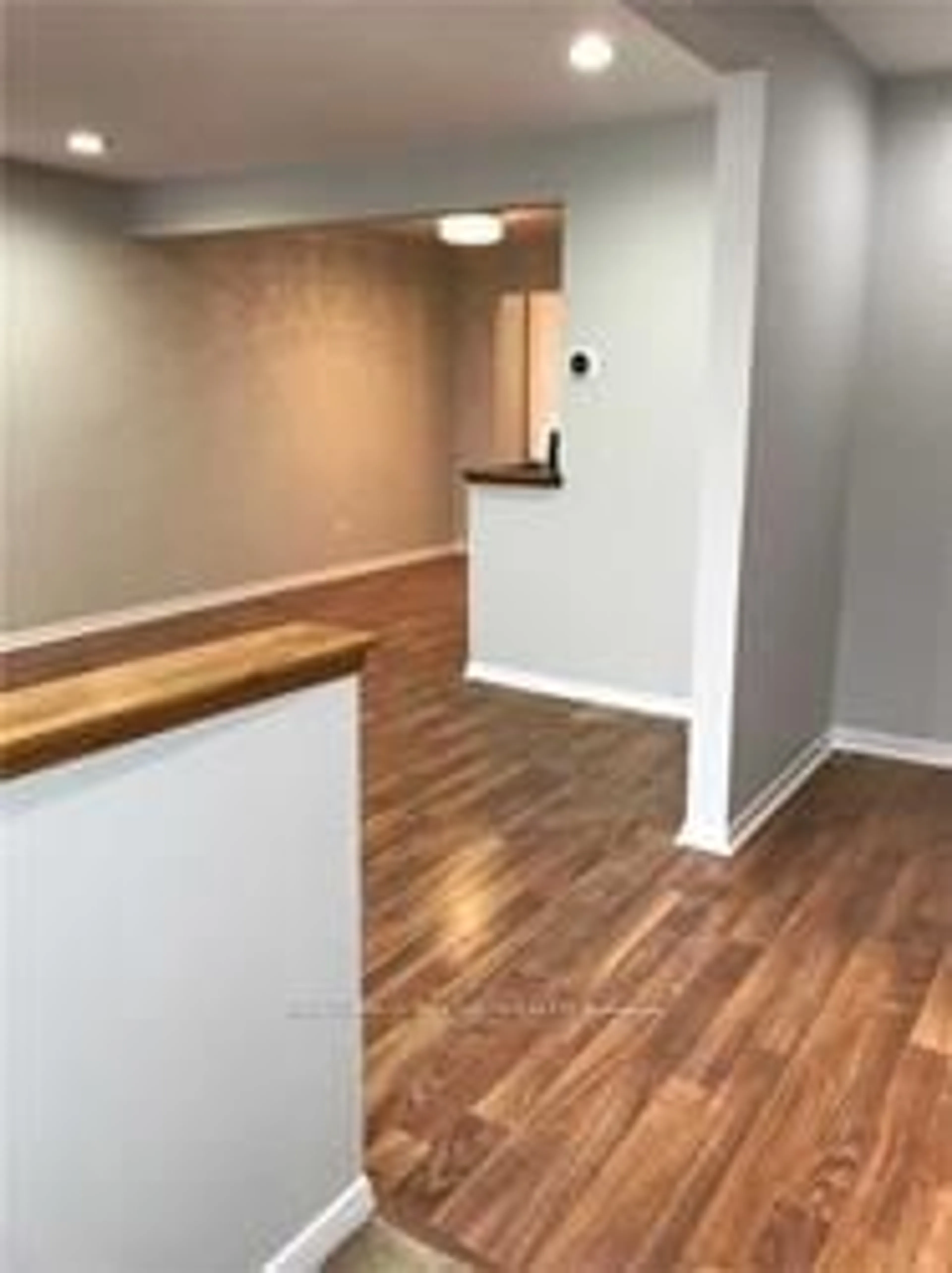 A pic of a room, wood floors for 2 Hughes St, Richmond Hill Ontario L4E 2V9