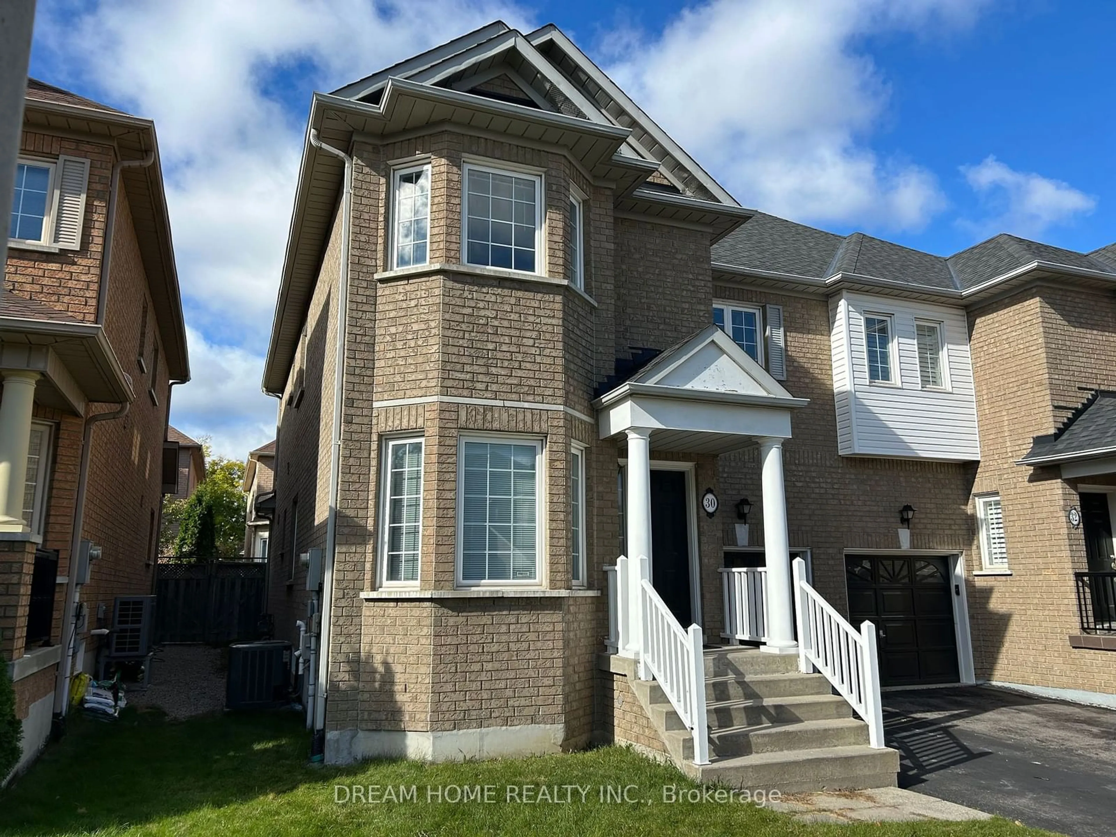 Frontside or backside of a home, the street view for 30 Monet St, Richmond Hill Ontario L4B 4H1