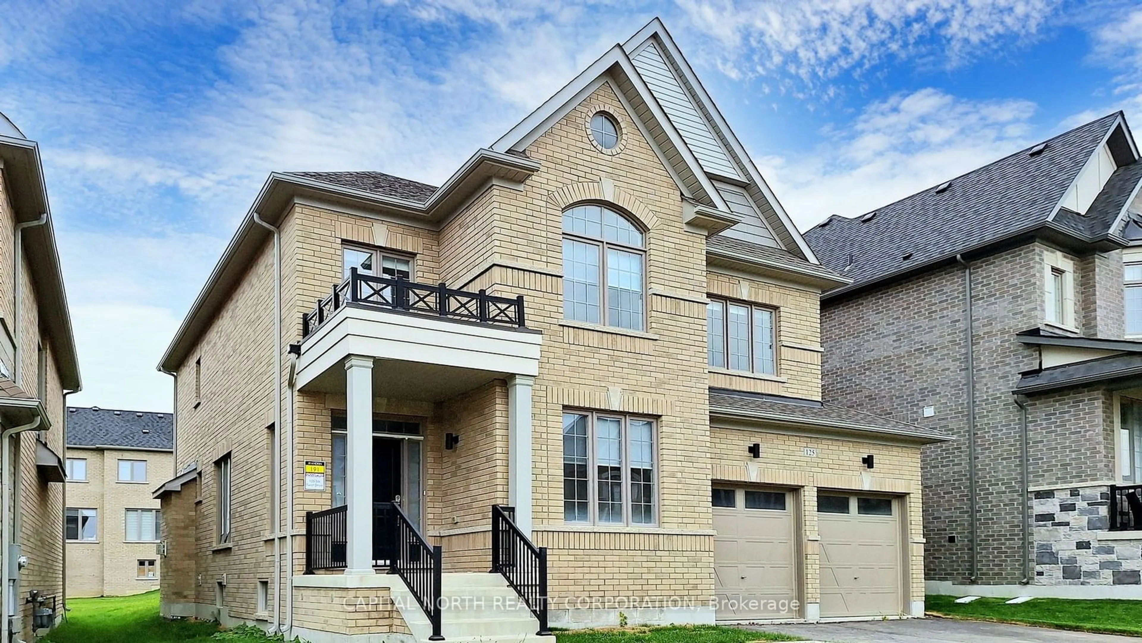 Home with brick exterior material for 125 Silk Twist Dr, East Gwillimbury Ontario L9N 0E5