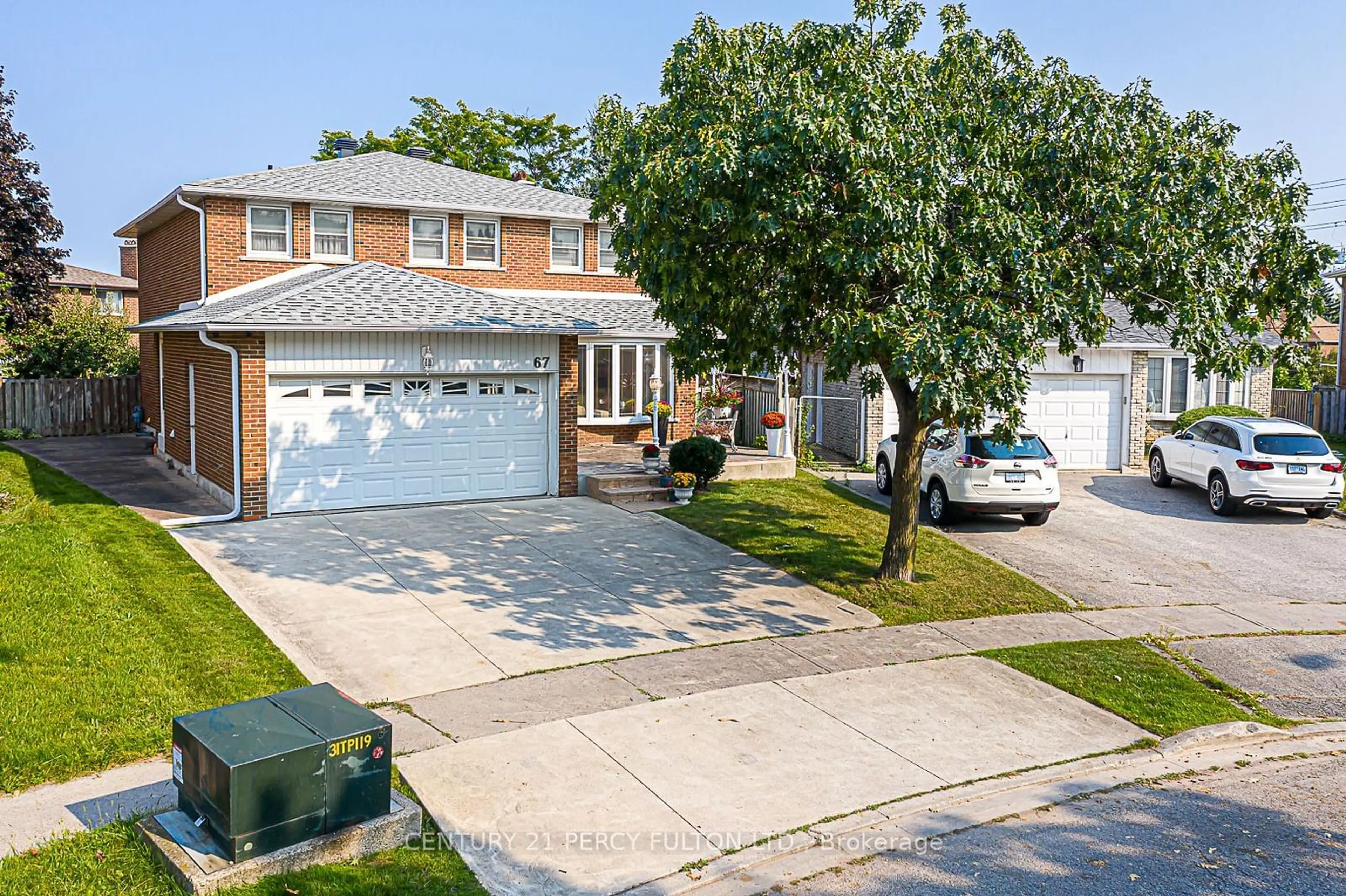 Frontside or backside of a home, the street view for 67 Cheeseman Dr, Markham Ontario L3R 3G3