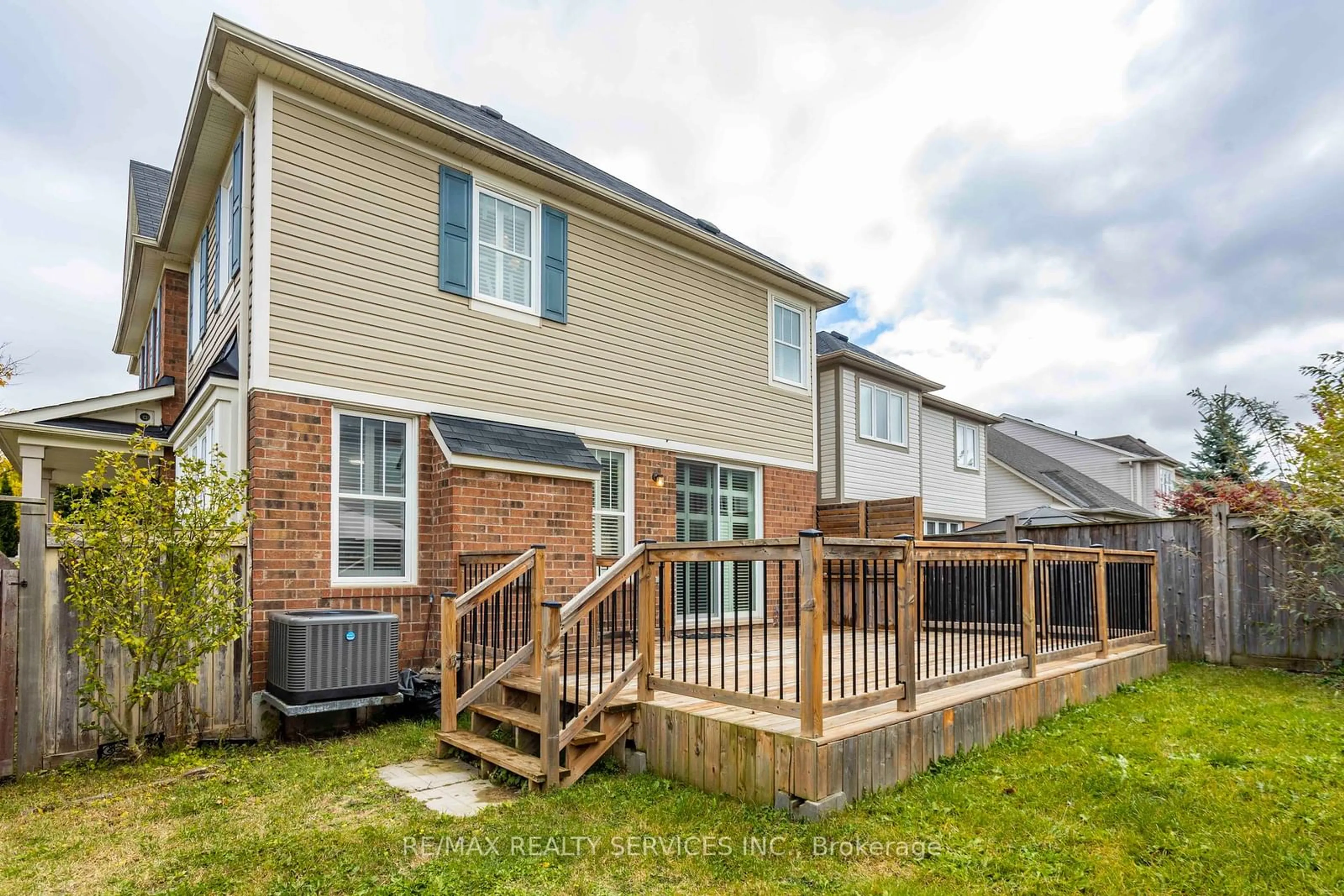 Frontside or backside of a home, the fenced backyard for 2 Kidd Cres, New Tecumseth Ontario L9R 0E1