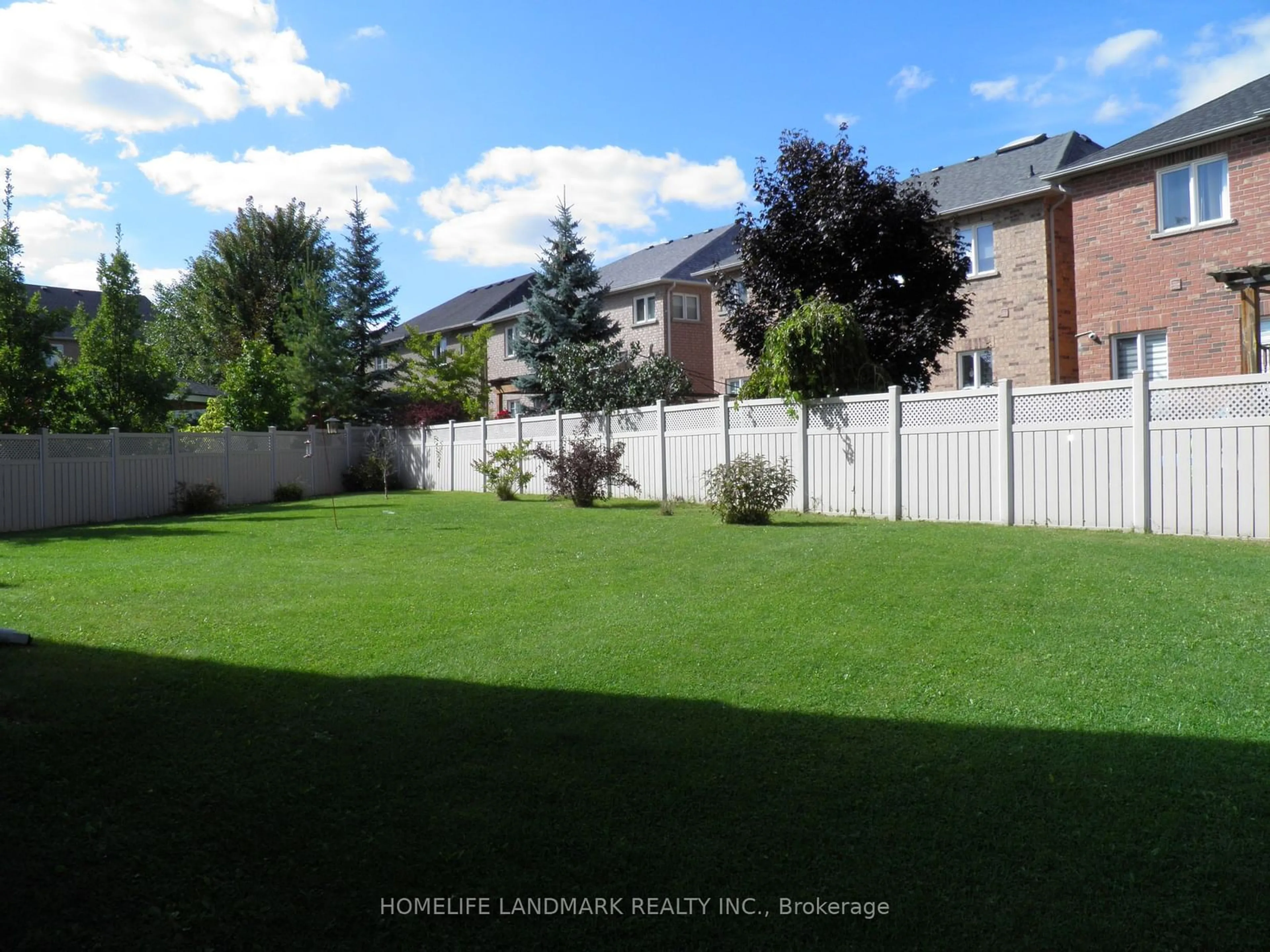 Frontside or backside of a home, the fenced backyard for 58 Gannett Dr, Richmond Hill Ontario L4E 0G2