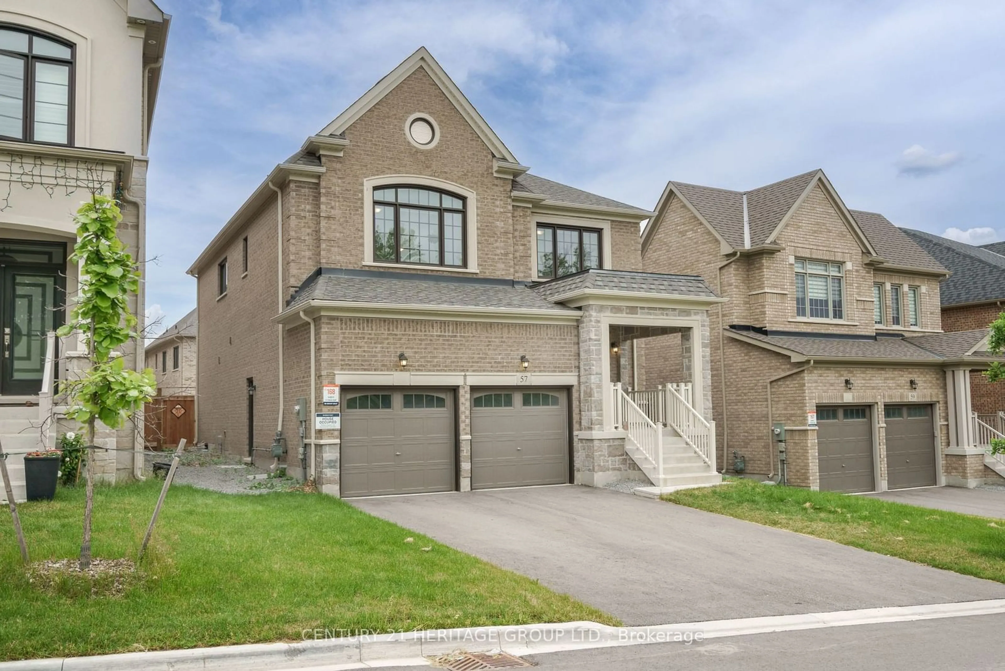 Frontside or backside of a home, the street view for 57 Terrain Crt, East Gwillimbury Ontario L9N 1M8