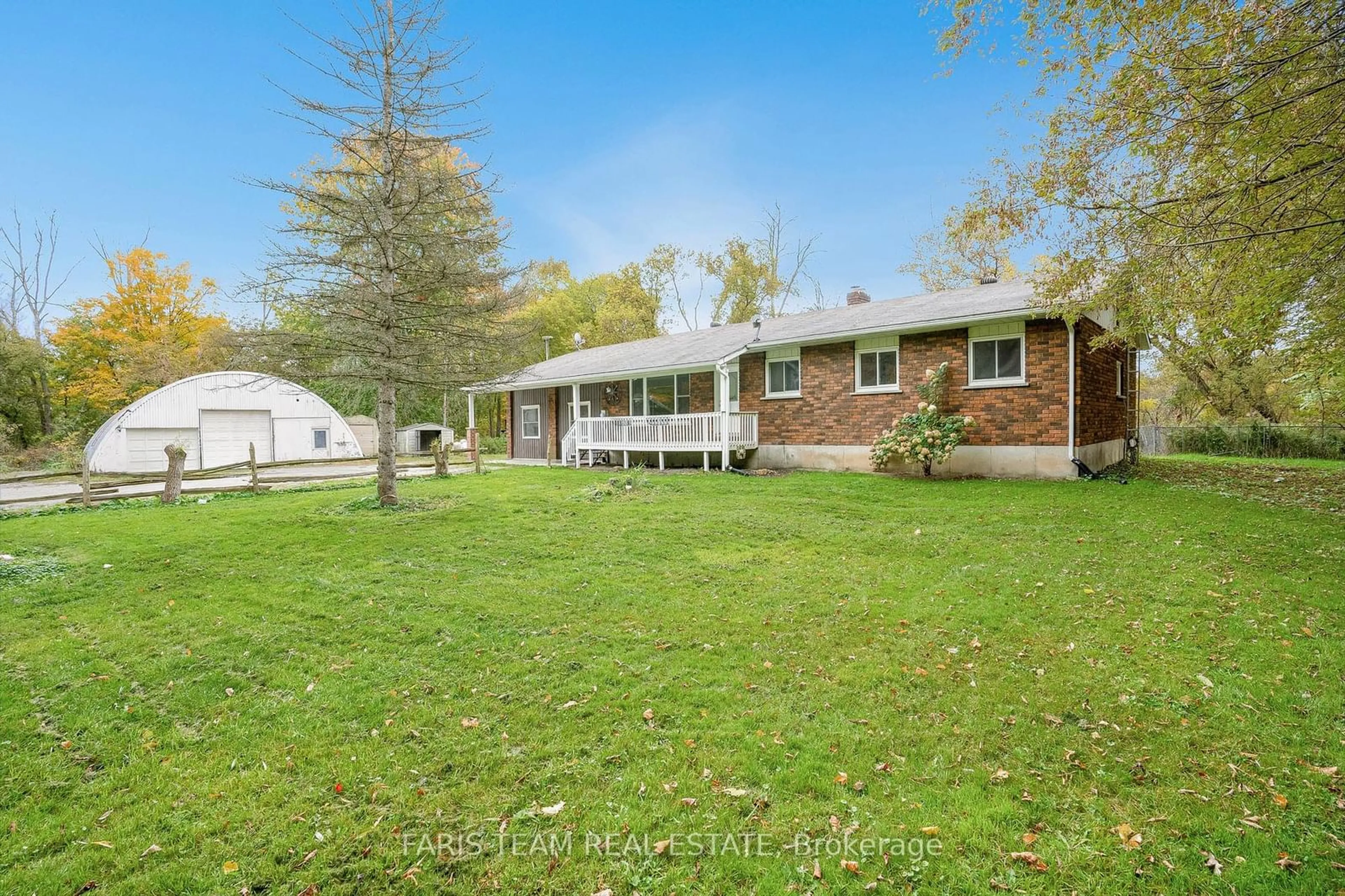 A pic from exterior of the house or condo, the fenced backyard for 161 Brentwood Rd, Essa Ontario L0M 1N0