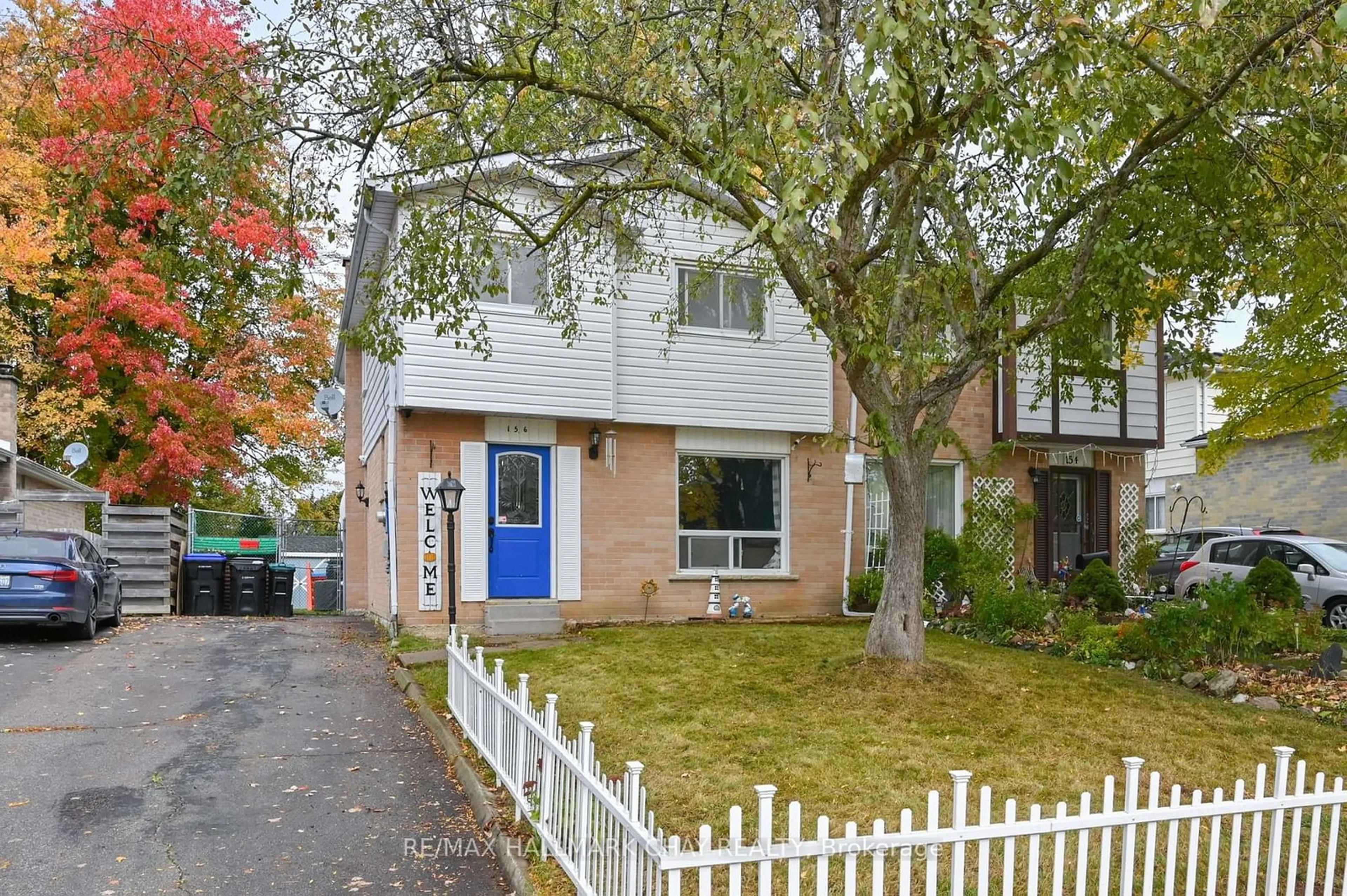 A pic from exterior of the house or condo, the fenced backyard for 156 Beattie Ave, New Tecumseth Ontario L9R 1C3