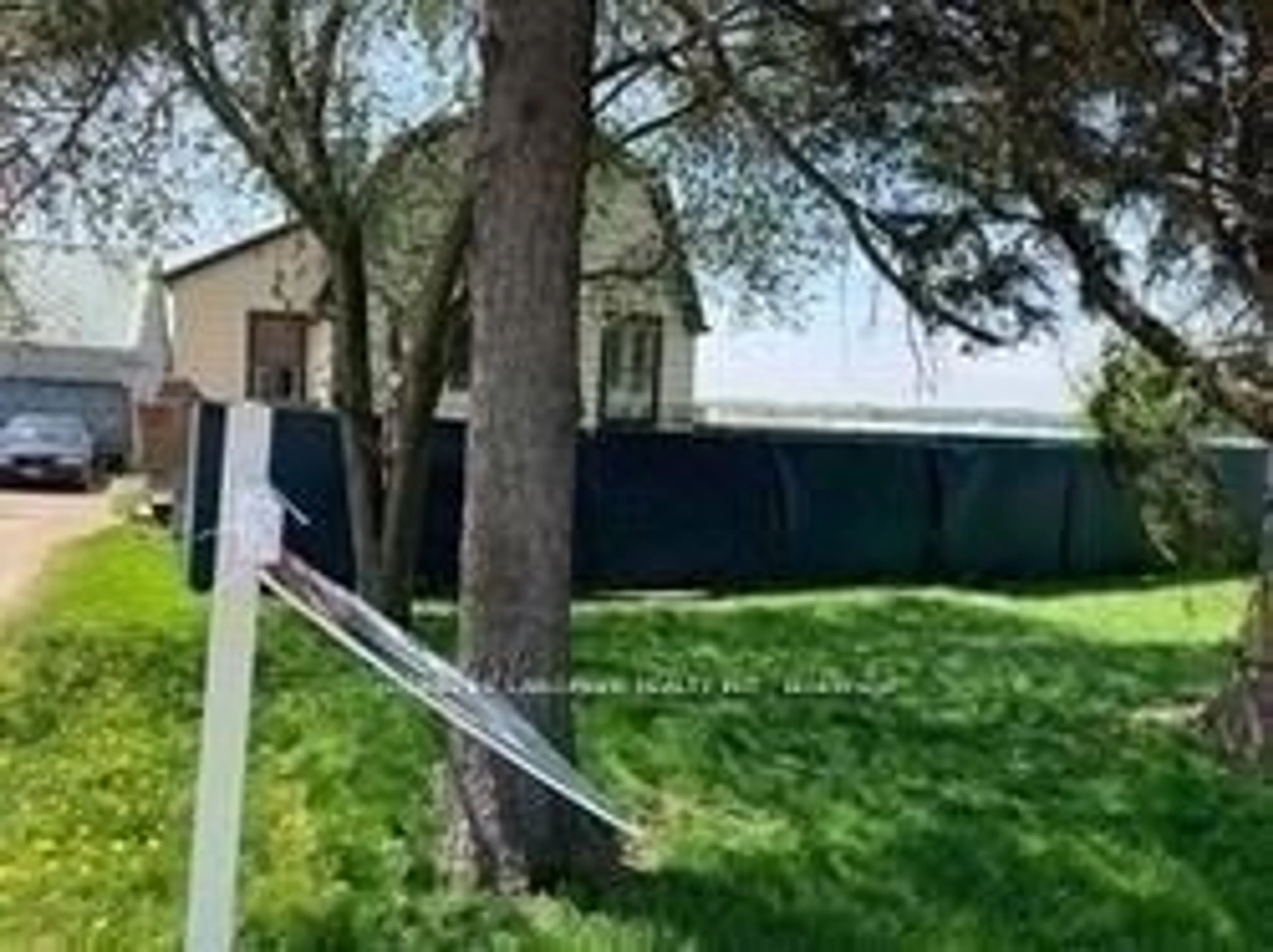 Frontside or backside of a home, the fenced backyard for 19580 Dufferin St, King Ontario L3Y 4V1