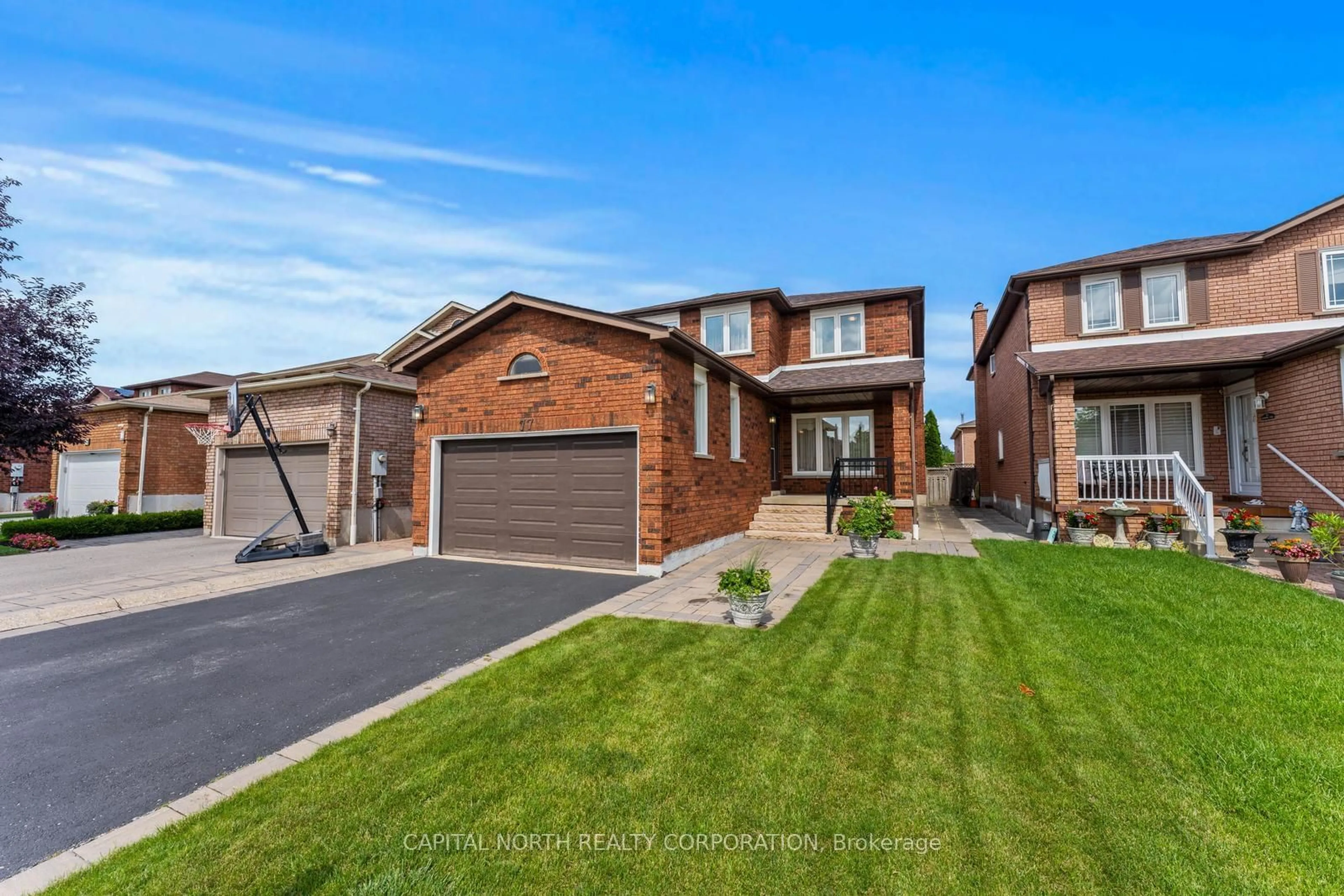 Home with brick exterior material for 77 Morning Star Dr, Vaughan Ontario L4L 6J3