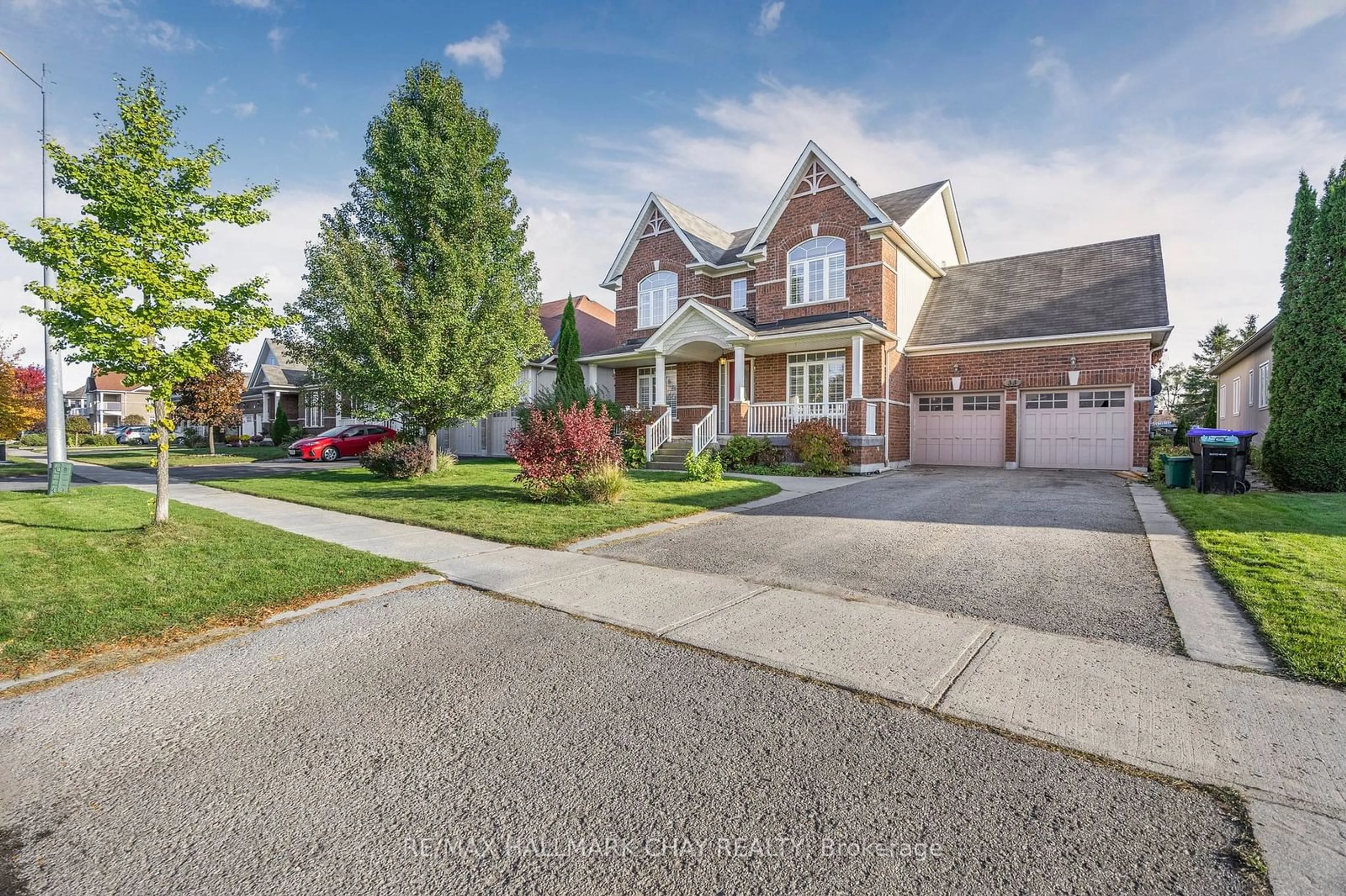 Frontside or backside of a home, the street view for 33 COLLIER Cres, Essa Ontario L0M 1B5